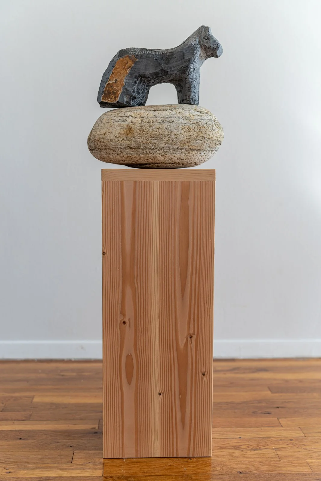 The Horse Fell Down The Mountain And Its Leg Broke Open Like A Heart, But The Man Said: It will Be Repaired (Horse), 2024, Soapstone, beach stone, wood, 35” X 12” X 9”

Photo credit: Benjamin Koditschek