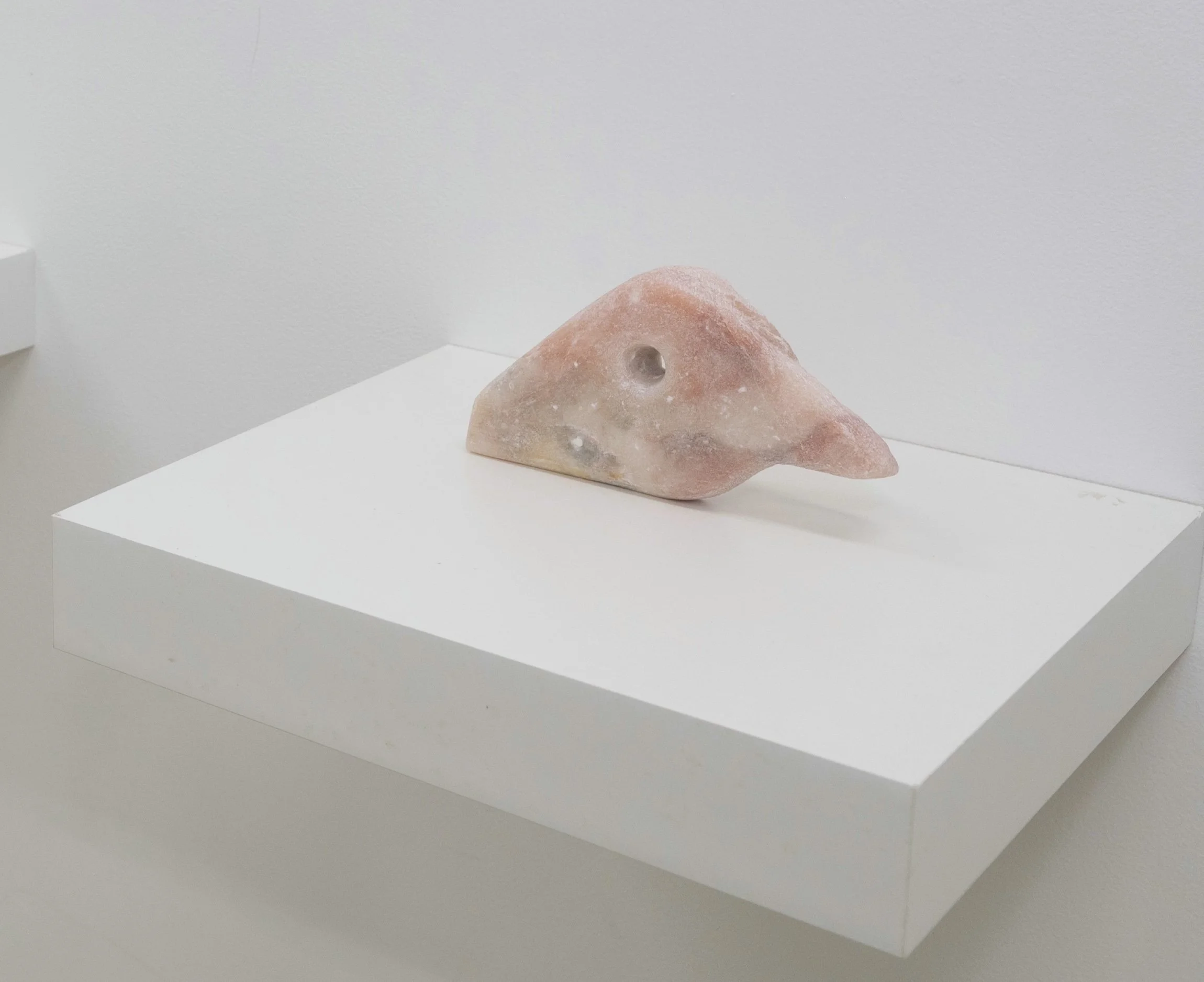 (In the fissure, the bird returns), 2025, Alabaster, 3” x 5” x .5”
