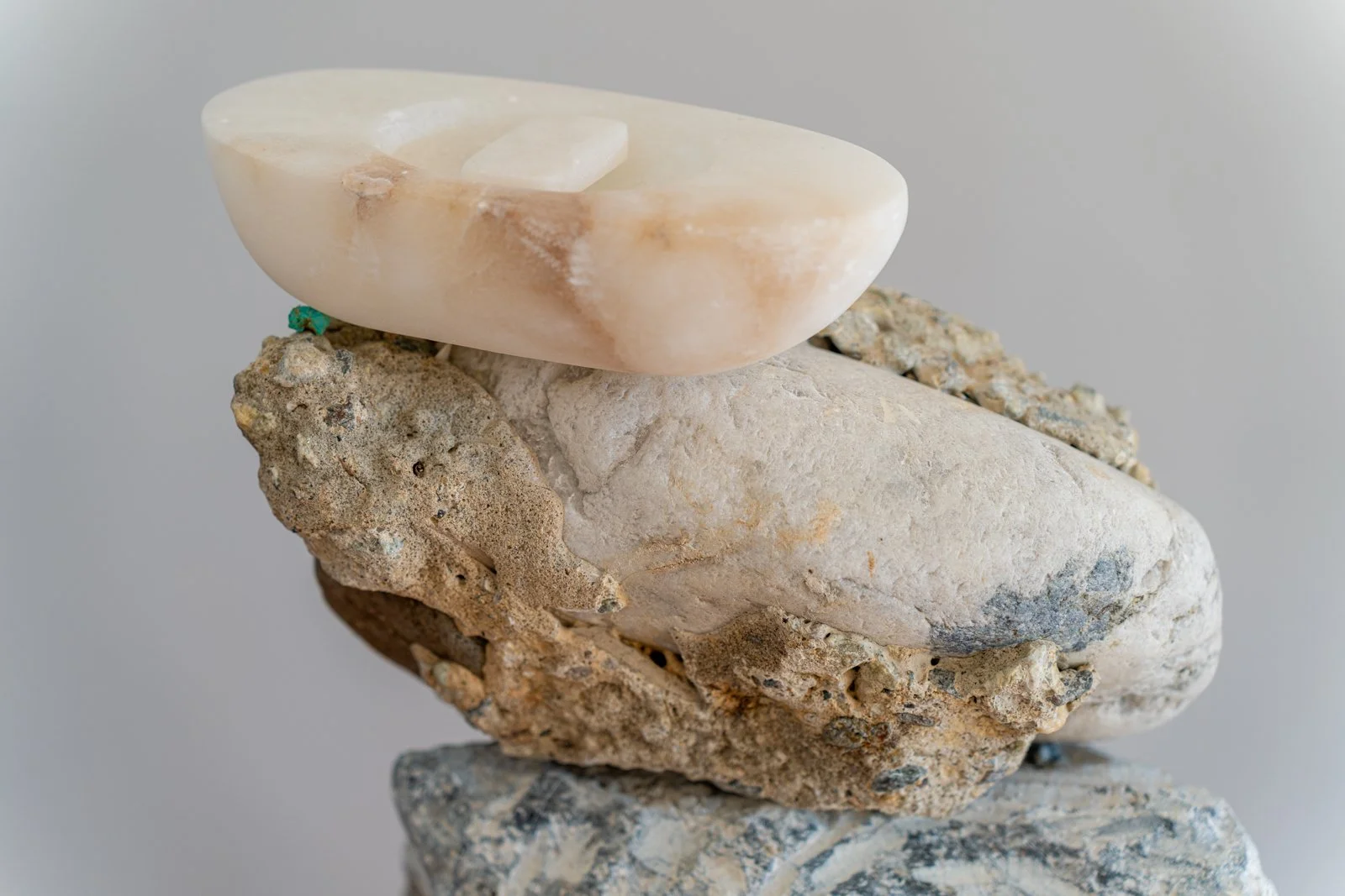 We Were Out At Sea And The Wind Was Getting Up And We Knew We Must Go Back To The Bay And The Wind Might Blow Us Home (Boat, Eye), 2024, Soapstone, beach stone, alabaster, 48.5” X 16” X 9.5”, (Detail i)