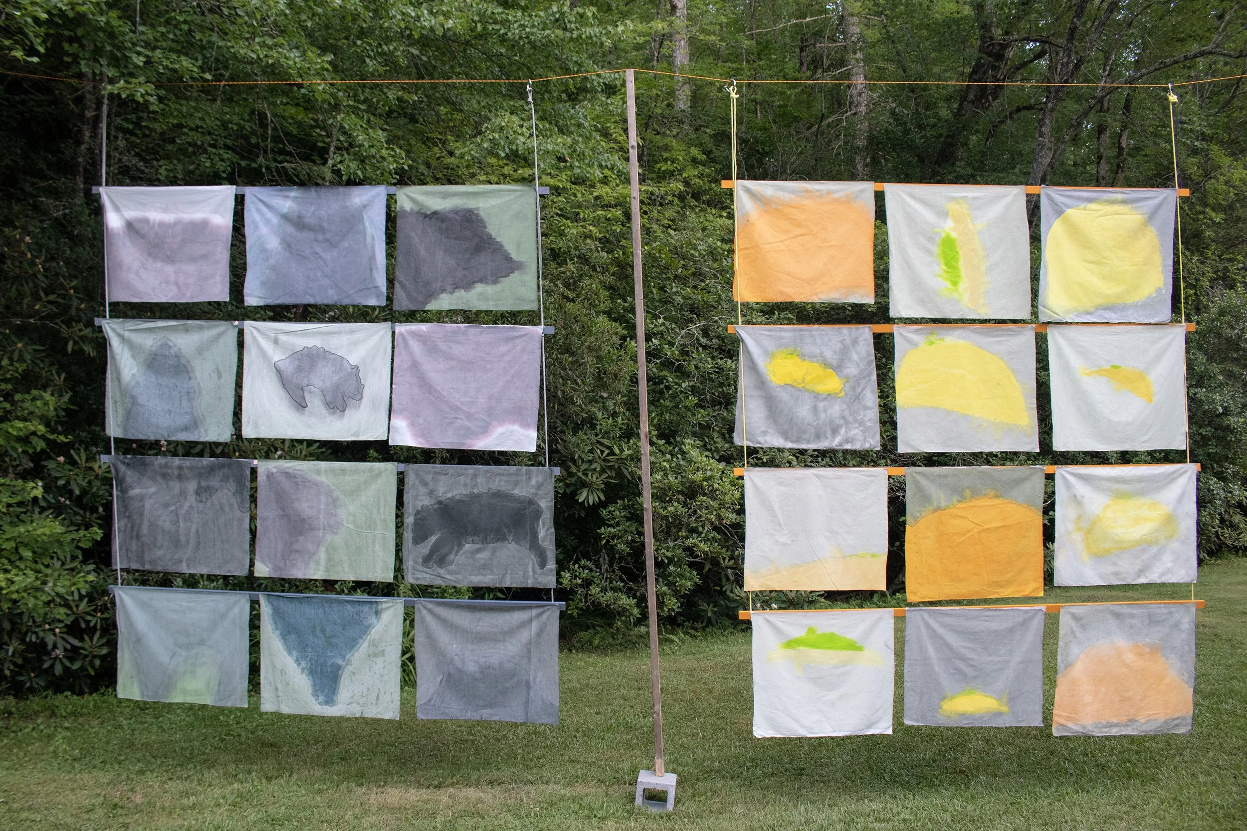 Song of Amergin (Floating with support, outdoors), Acrylic, dye, muslin, rope, wood, cinder blocks, Installation at the Hambidge Center for the Arts, Rabun Gap, GA, 2019