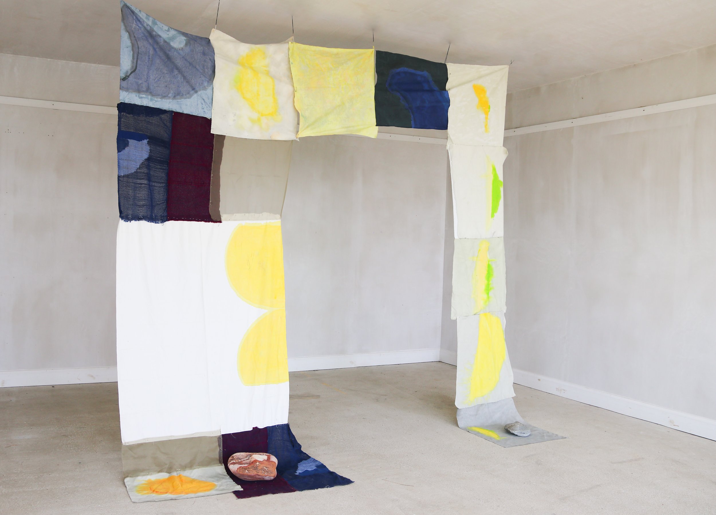 Untitled (V, golden ring), 2018-2026, woven cotton, wool, muslin, silk, dye, acrylic, thread, stone