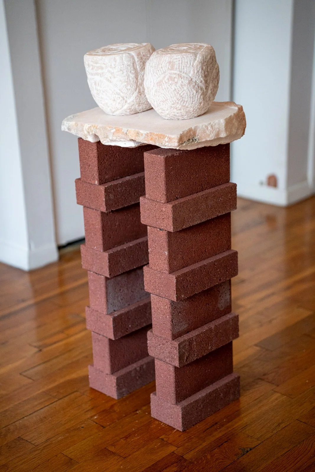 “Love Is Mysterious, It Always Helps To Let Go, Doesn’t It?” The Woman Said To Me, and I Saw Two Cosmic Blooms Before My Eyes Which I Knew Were A Vision Of Love (Blooms), 2024, Marble, brick, 30” X 14” X 9.5"
