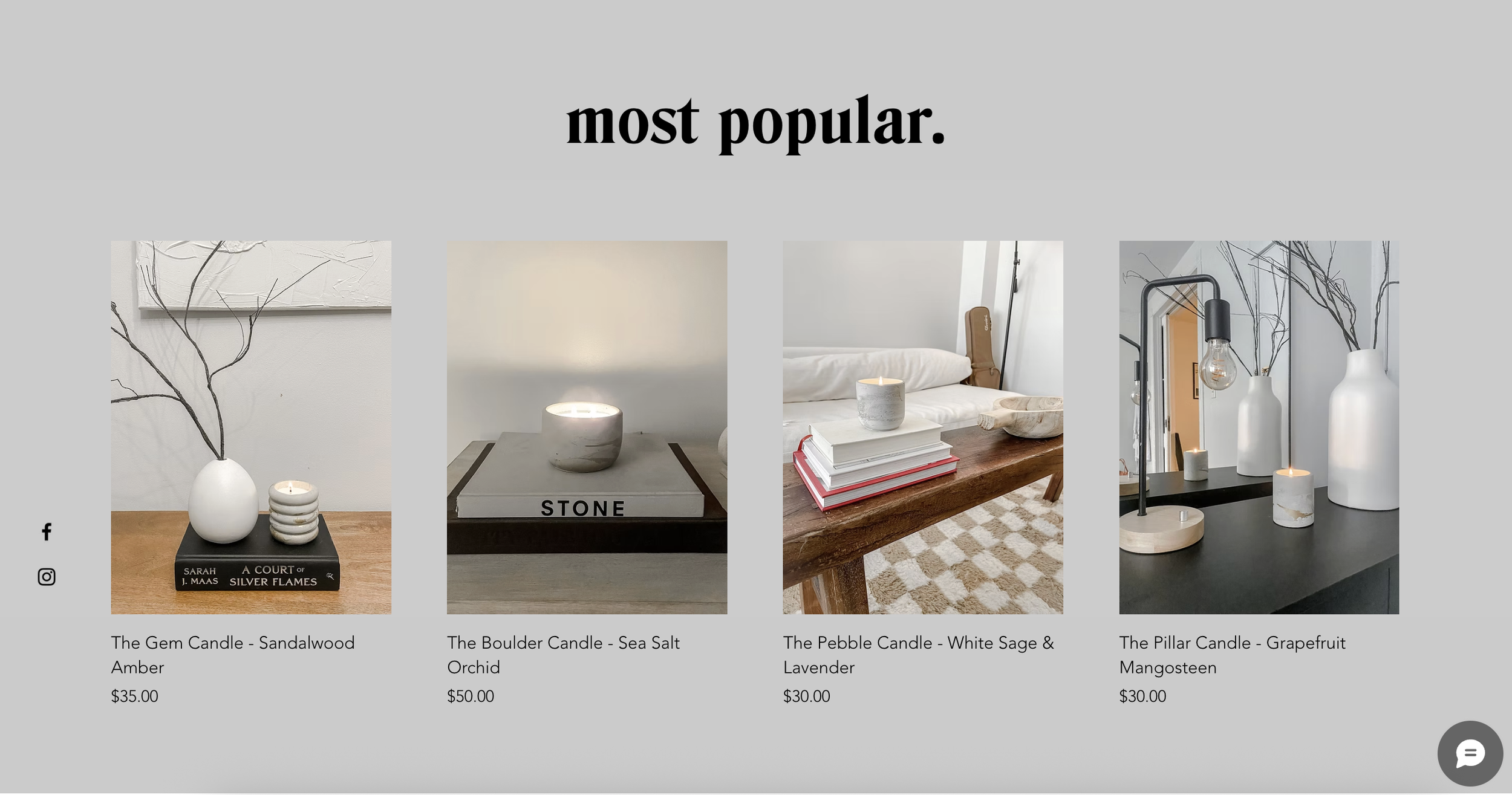 A webpage featuring four candles with minimalist decor. The first is a white oval vase with twigs and a small candle, priced at $35. The second is a white marble candle on a book labeled 'STONE,' priced at $50. The third is a white and lavender candle on a wooden table with books and a bed in the background, priced at $30. The fourth is a white vase with twigs, a black metal lamp, and candles on a black surface, priced at $30.