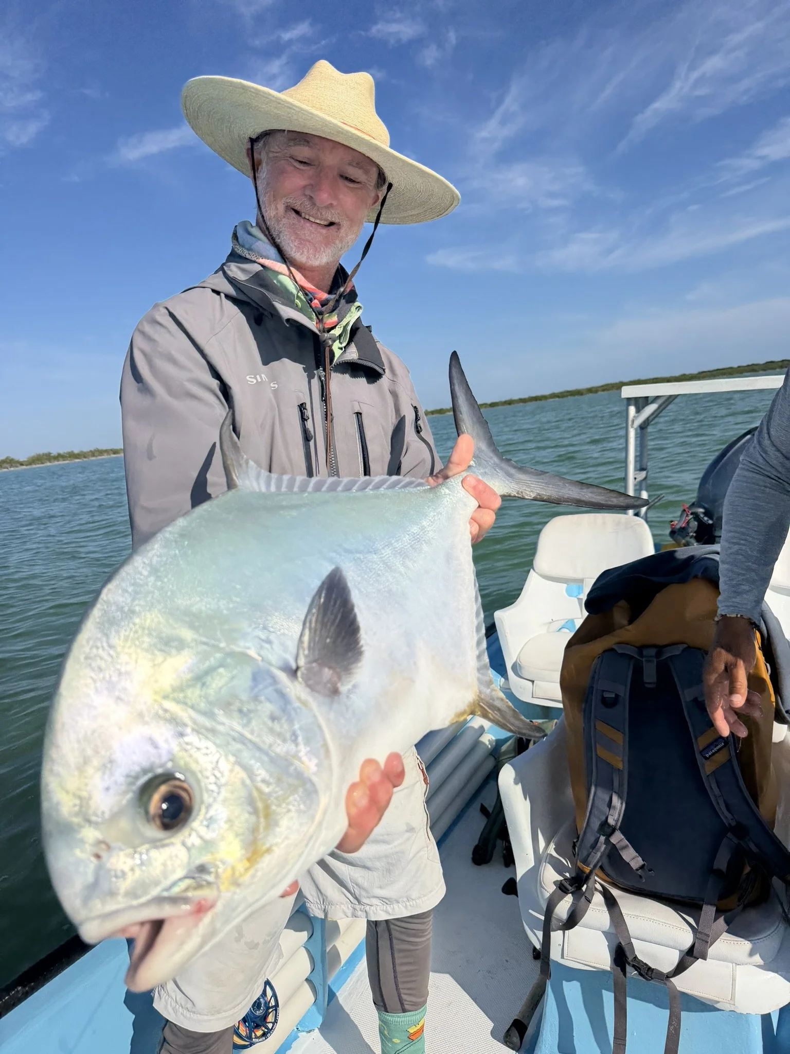 angler-holding-permit-ascension-bay-kay-fly-lodge.jpg