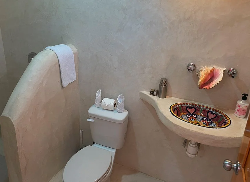 All guest rooms at Kay Fly Lodge in Punta Allen, Mexico feature private bathrooms.