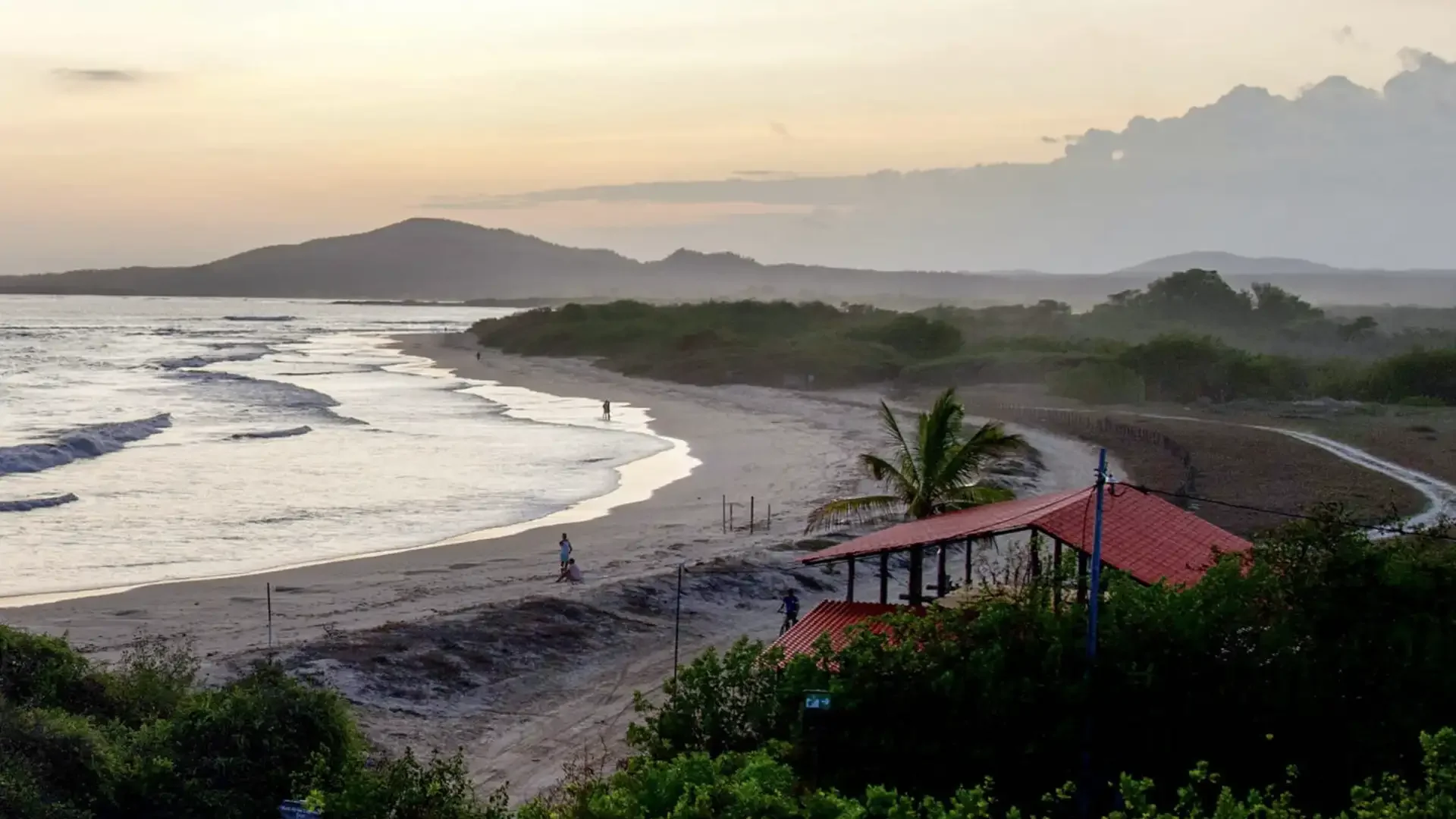 Ocean, beach, and mountain view from Iguana Crossing Hotel on Isabela Island Galápagos"