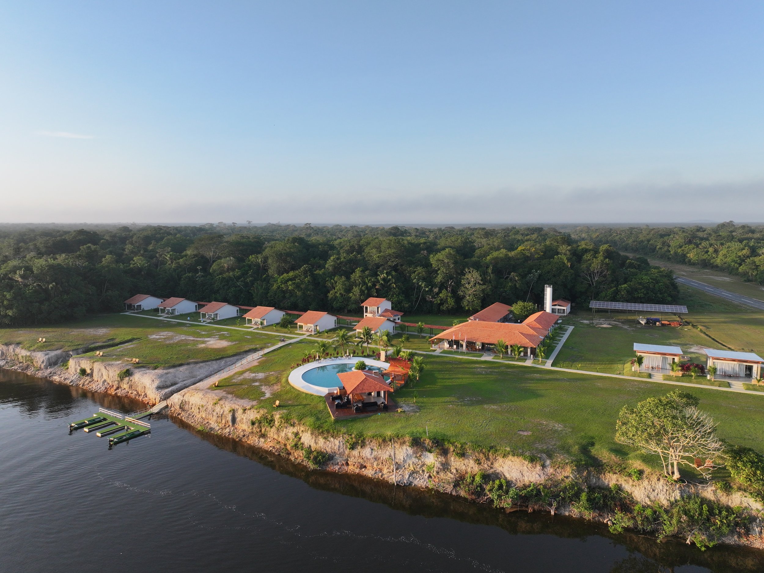 Aerial view of Agua Boa Amazon Lodge on the bank of the Agua Boa River in Brazil.