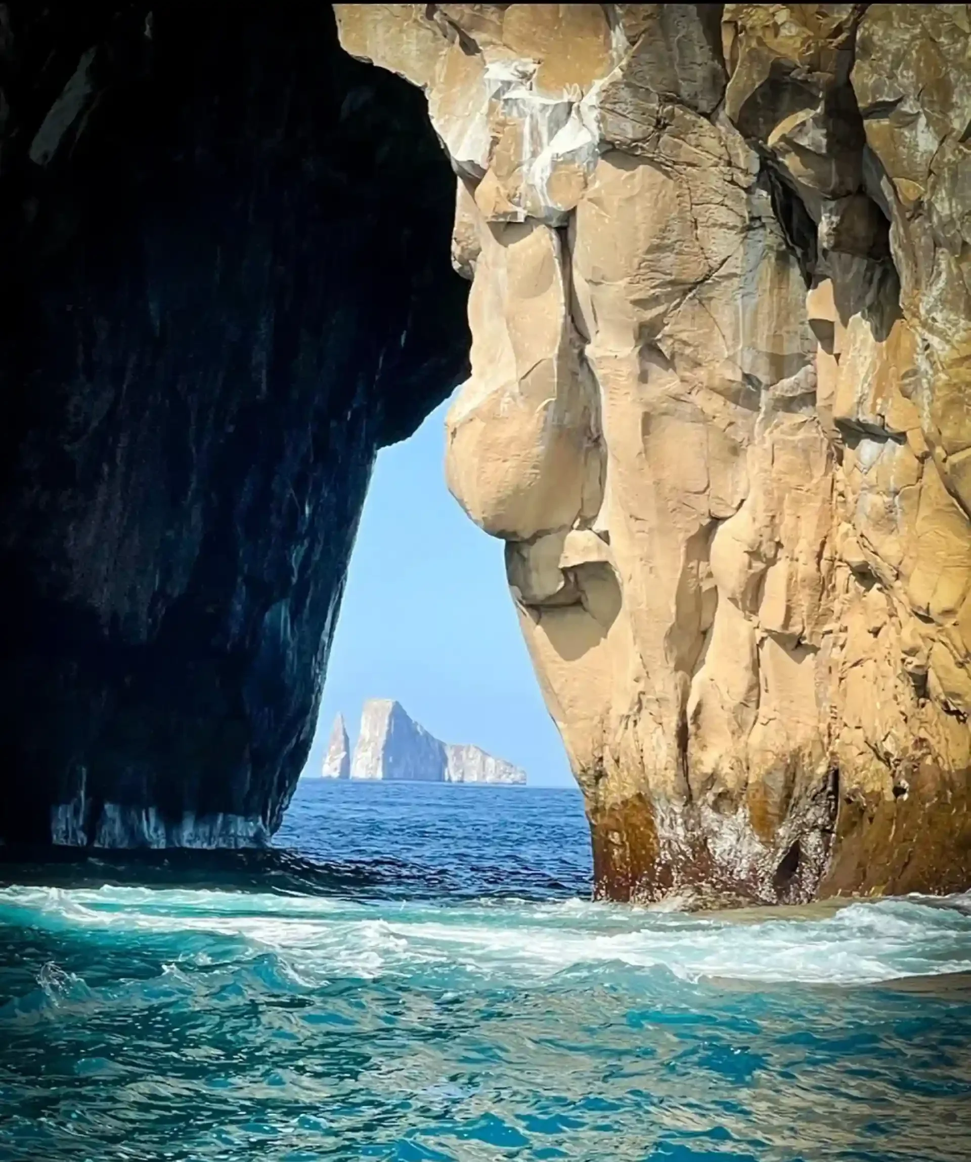 galapagos-islands-marlin-fishing-rock-arch-ocean-cave.webp