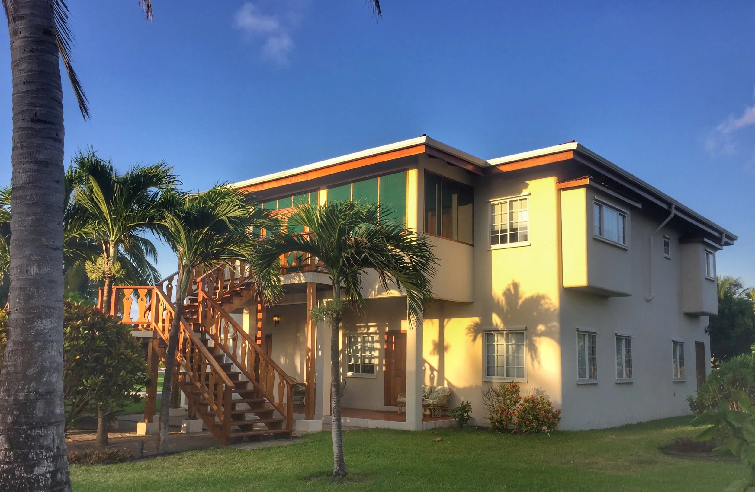 Garden Villa accommodations at Turneffe Flats with views of gardens and Caribbean Sea
