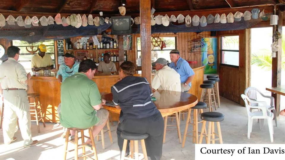 Guests enjoying conversation and cold drinks after a day fishing the flats around Andros Island,