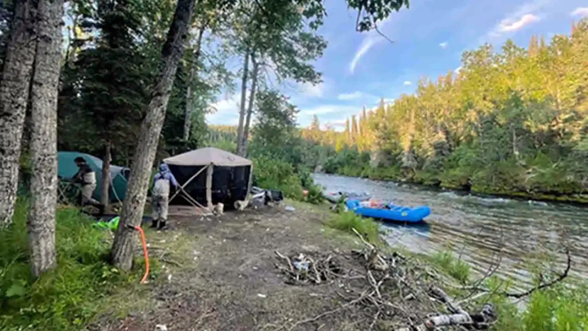 Breaking down camp along American Creek in Alaska before heading out for a day of remote fly fishing.
