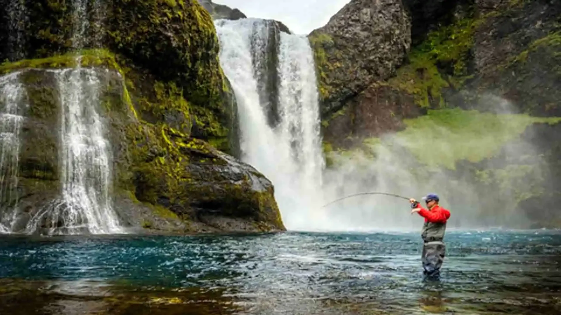 iceland-fly-fishing-waterfall-river-angler.webp