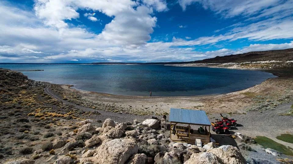 Shoreline of Jurassic Lake in Argentina, popular for rainbow trout fishing trips with Estancia Laguna Verde Lodge.
