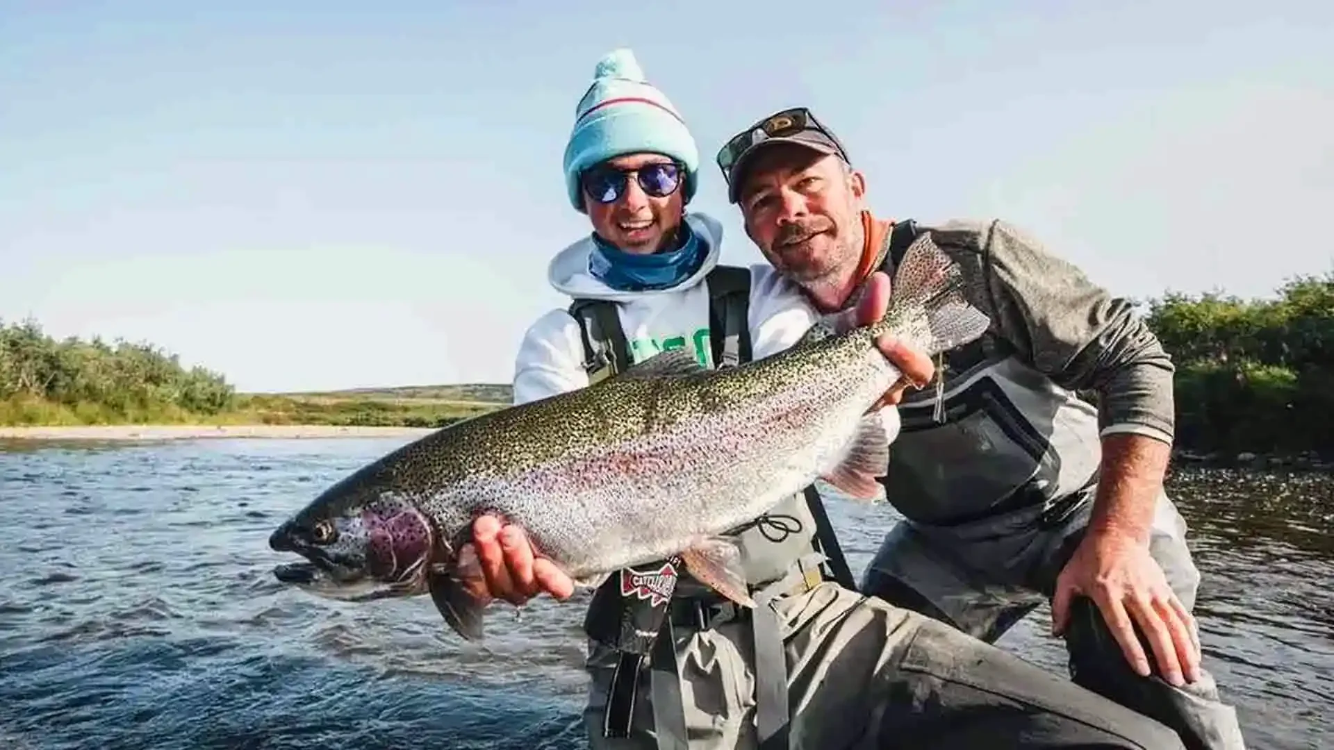 Alaska fly fishing adventure: rainbow trout caught on mouse pattern at American Creek.
