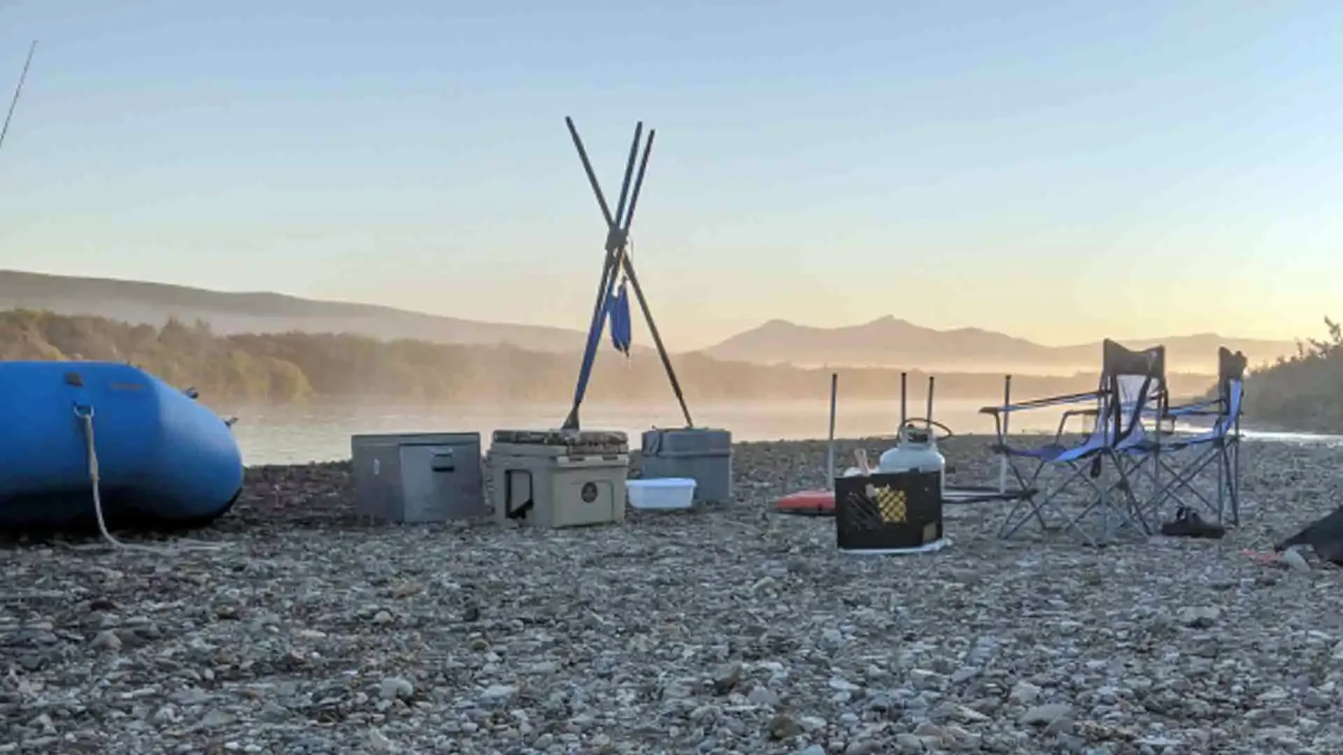 Setting up camp along the banks of American Creek in Alaska during a remote fly fishing and wilderness float trip.