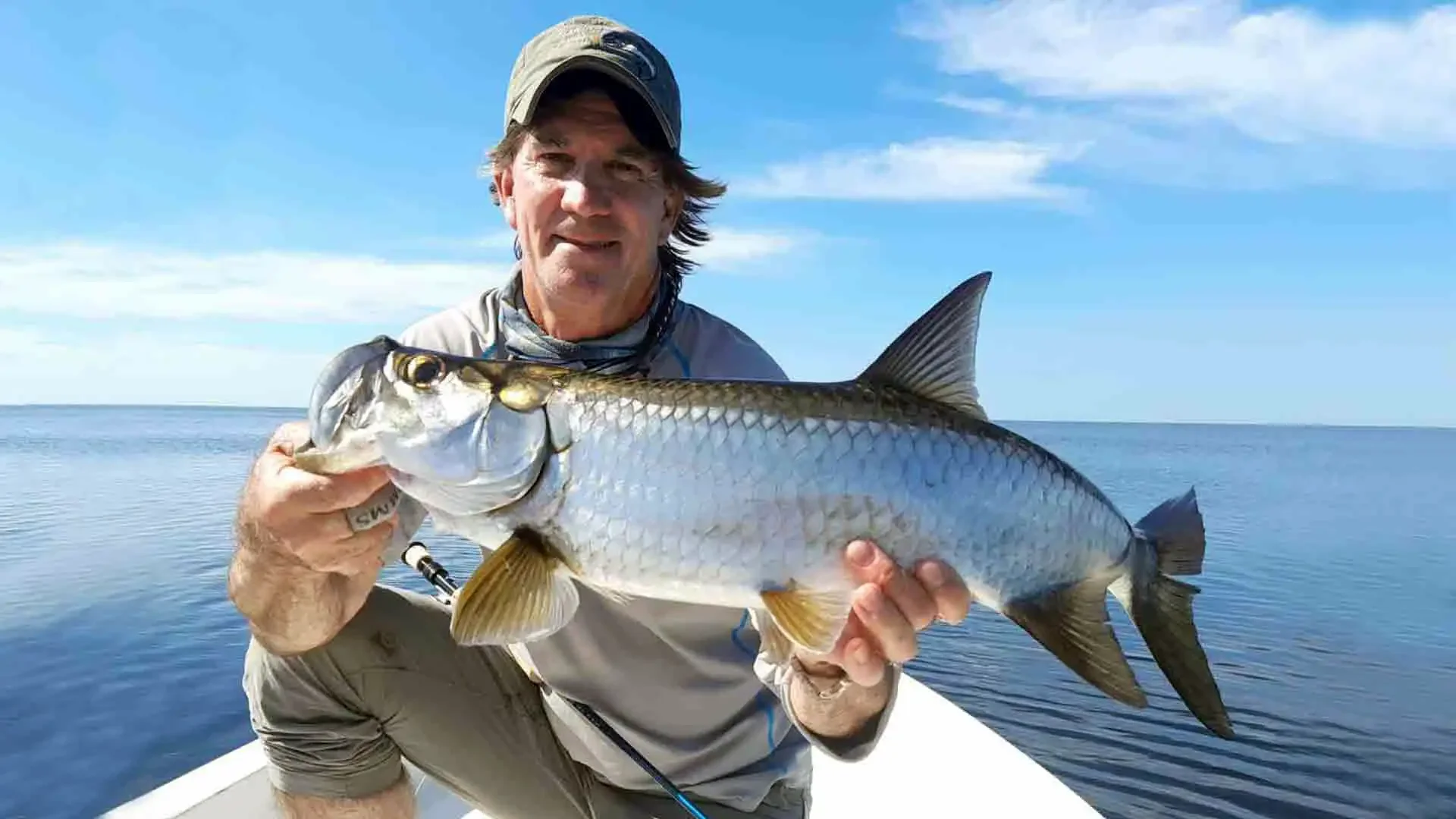 brad-staples-holding-small-tarpon-campeche-mexico.webp.webp