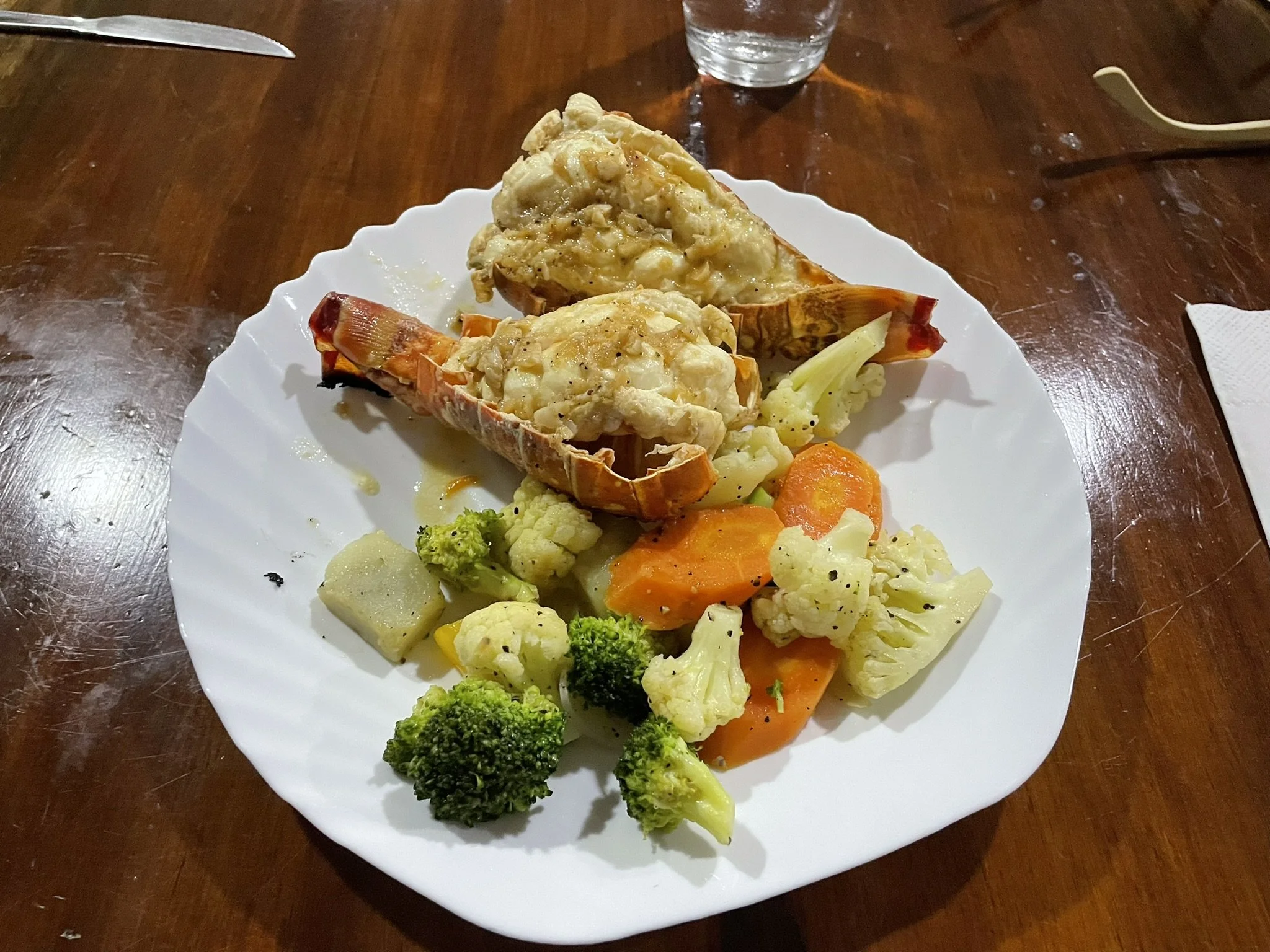 Fresh lobster tail dinner from Ascension Bay served to guests at Kay Fly Lodge in Punta Allen, Mexico.