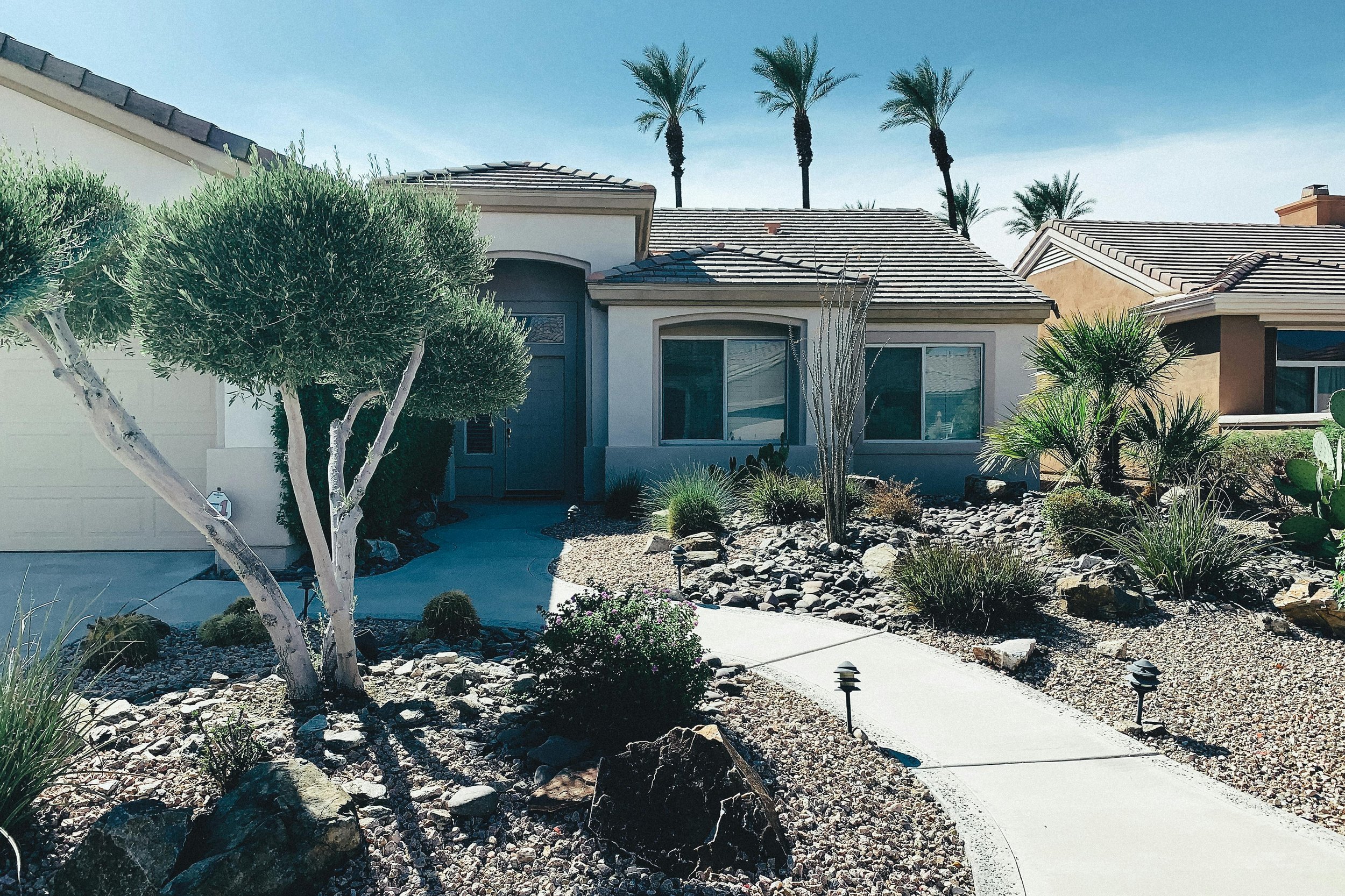 image of house with gravel landscaping