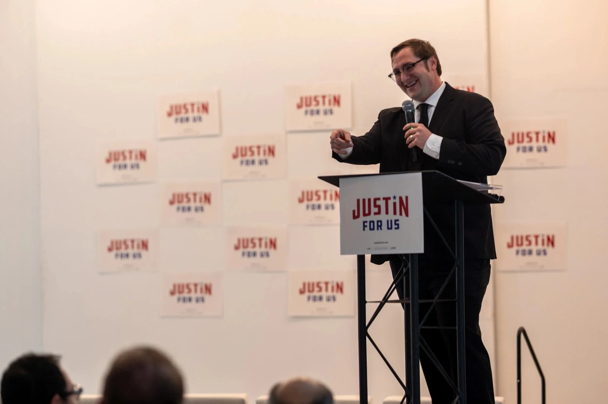 Justin Strekal speaking from a podium