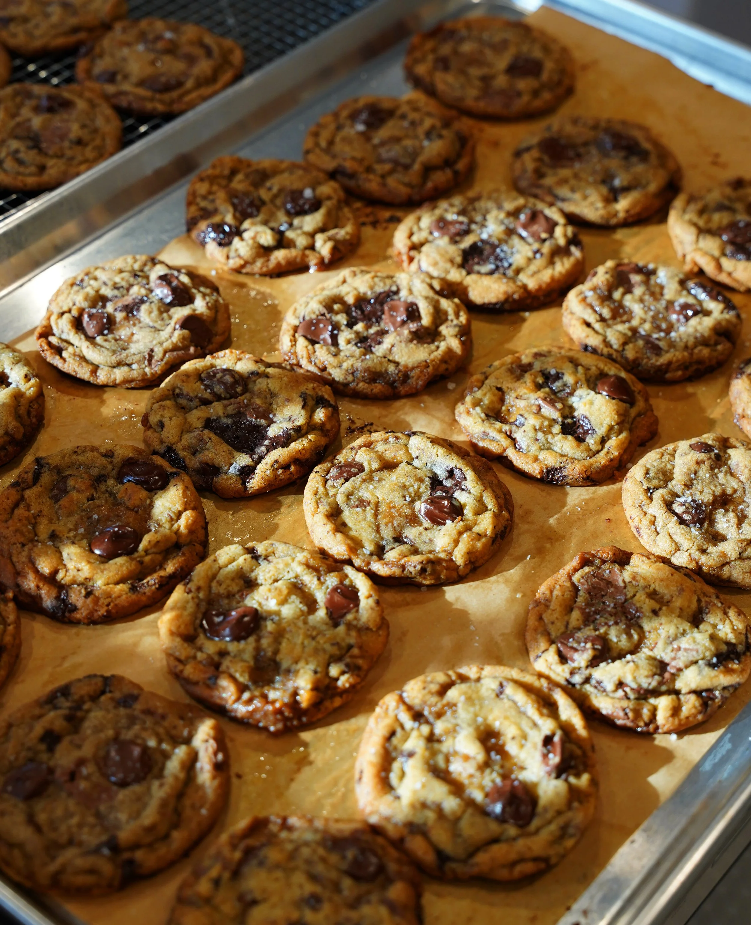 Chocolate chip cookies on a baking sheet.