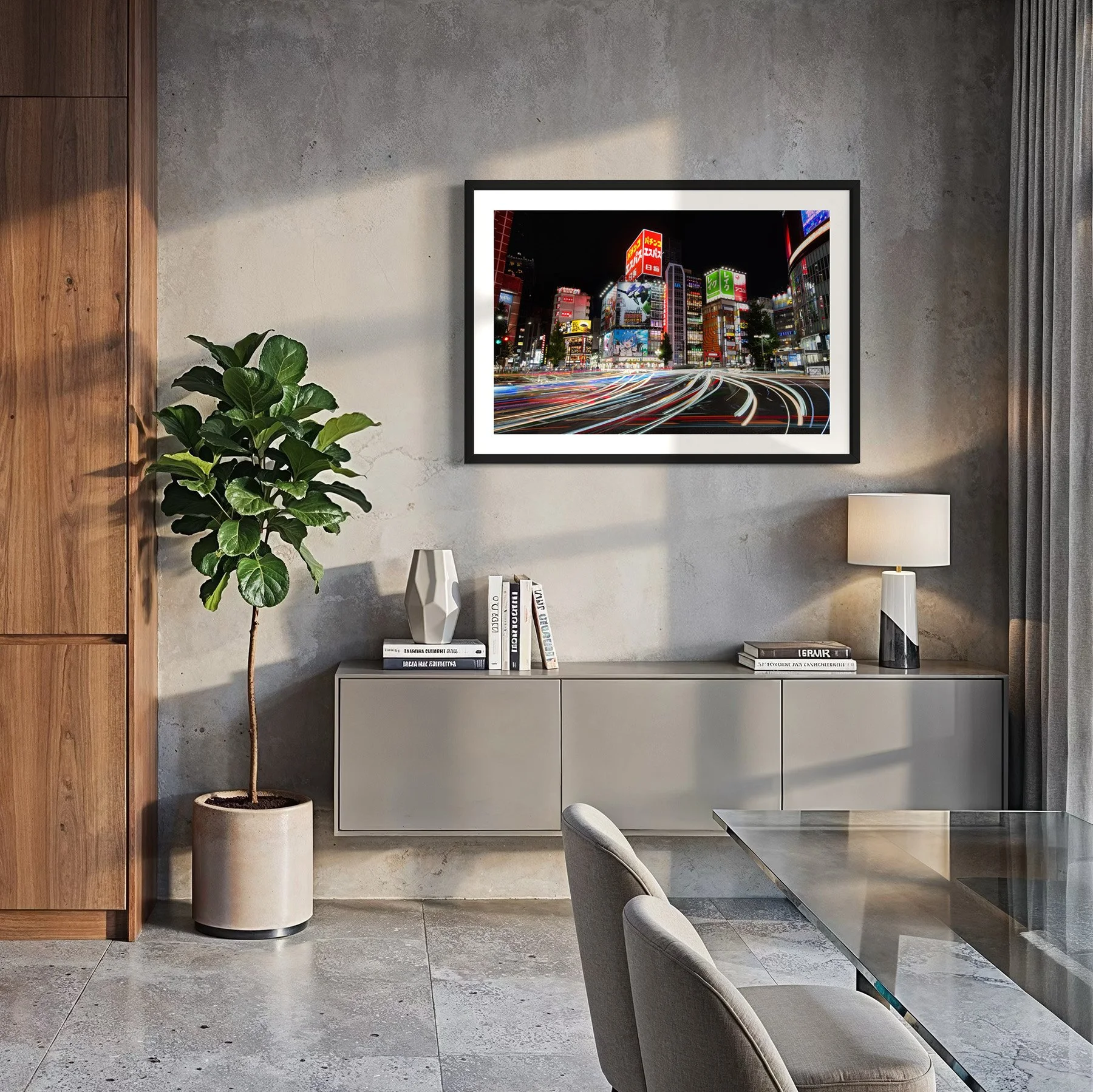Tokyo night cityscape print displayed in a modern dining interior, featuring neon signage, illuminated architecture and flowing traffic trails.