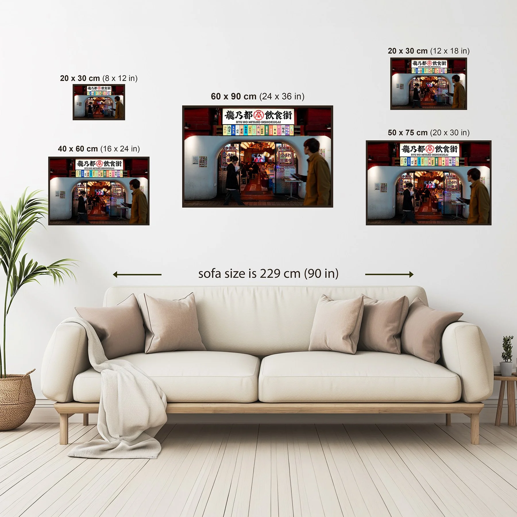 Photography print size guide showing available wall art sizes from 20 × 30 cm to 60 × 90 cm above a sofa for scale.