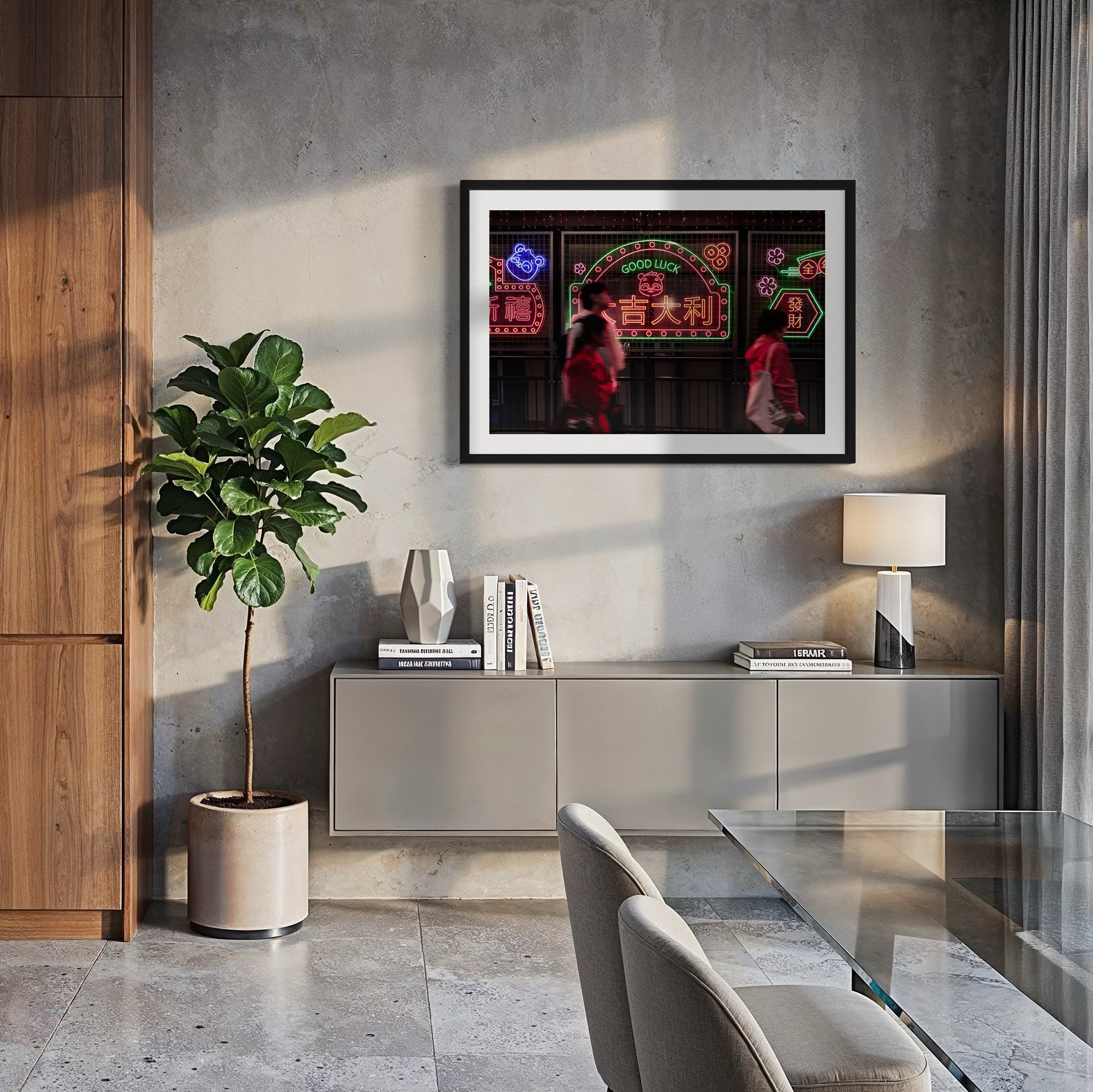 Contemporary dining room with concrete walls and framed Hong Kong neon photography print, featuring motion blur figures walking past illuminated Chinese neon signs.