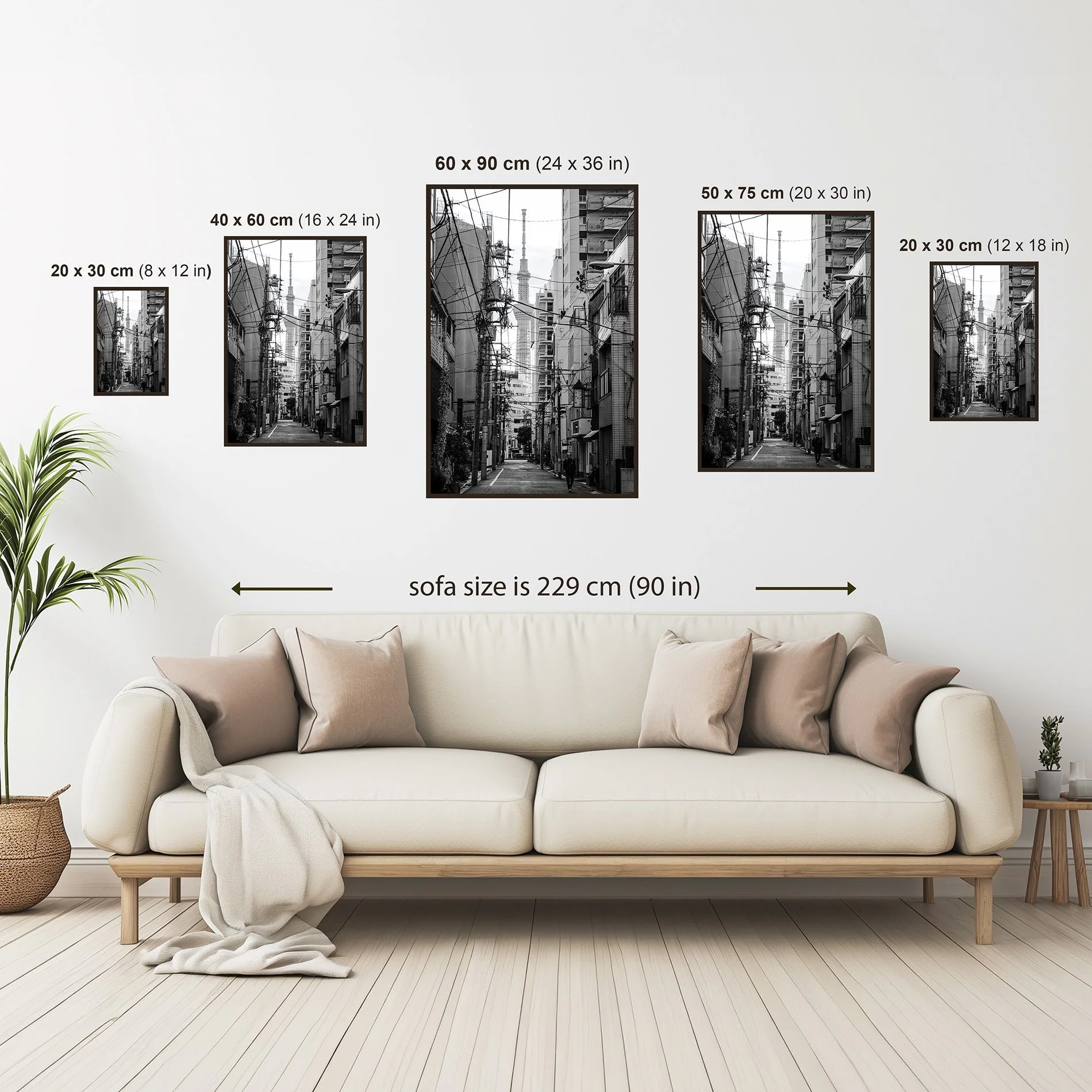 Photography print size guide showing available wall art sizes from 20 × 30 cm to 60 × 90 cm above a sofa for scale.