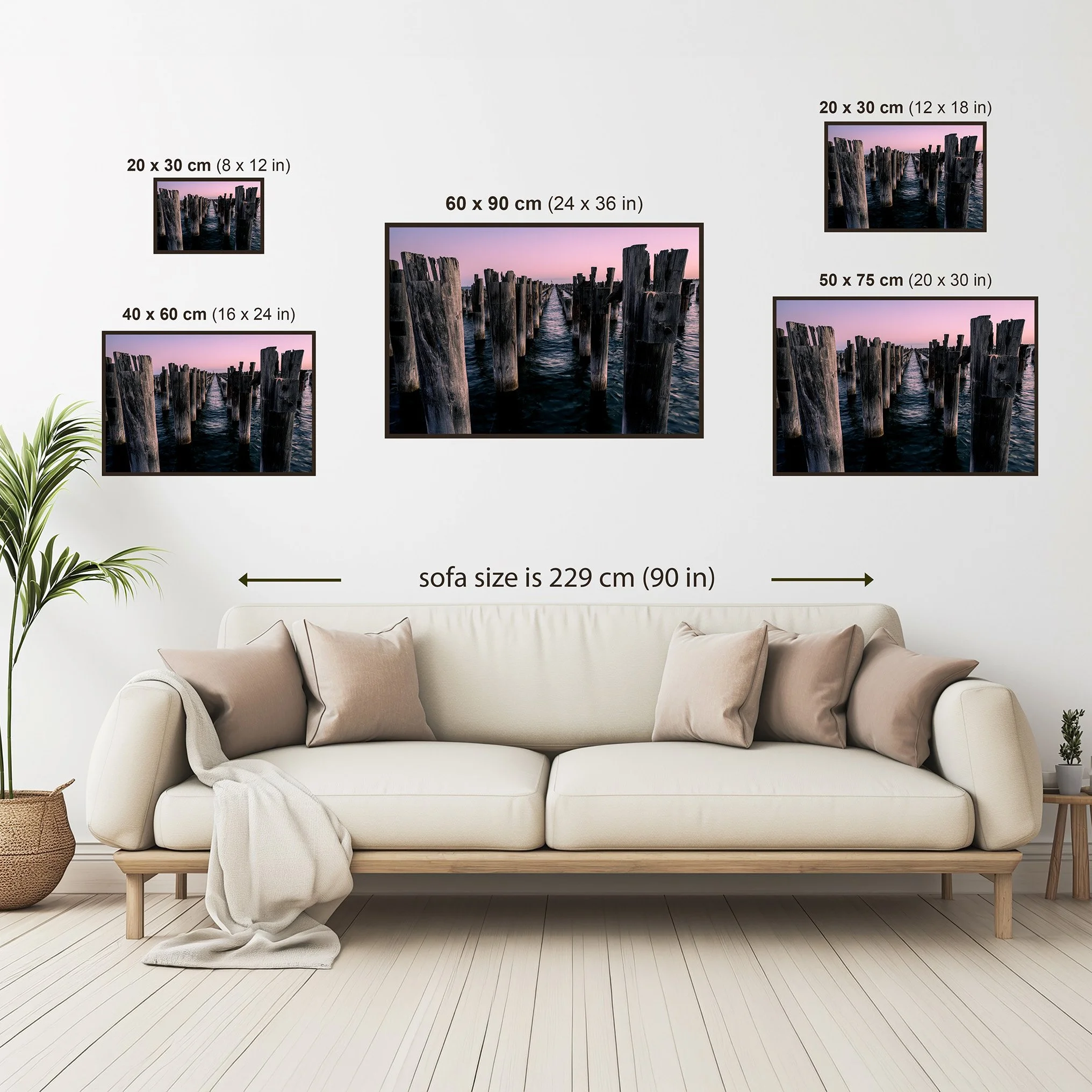 Size comparison guide showing Princes Pier Melbourne photography print displayed above a sofa in multiple available print dimensions.