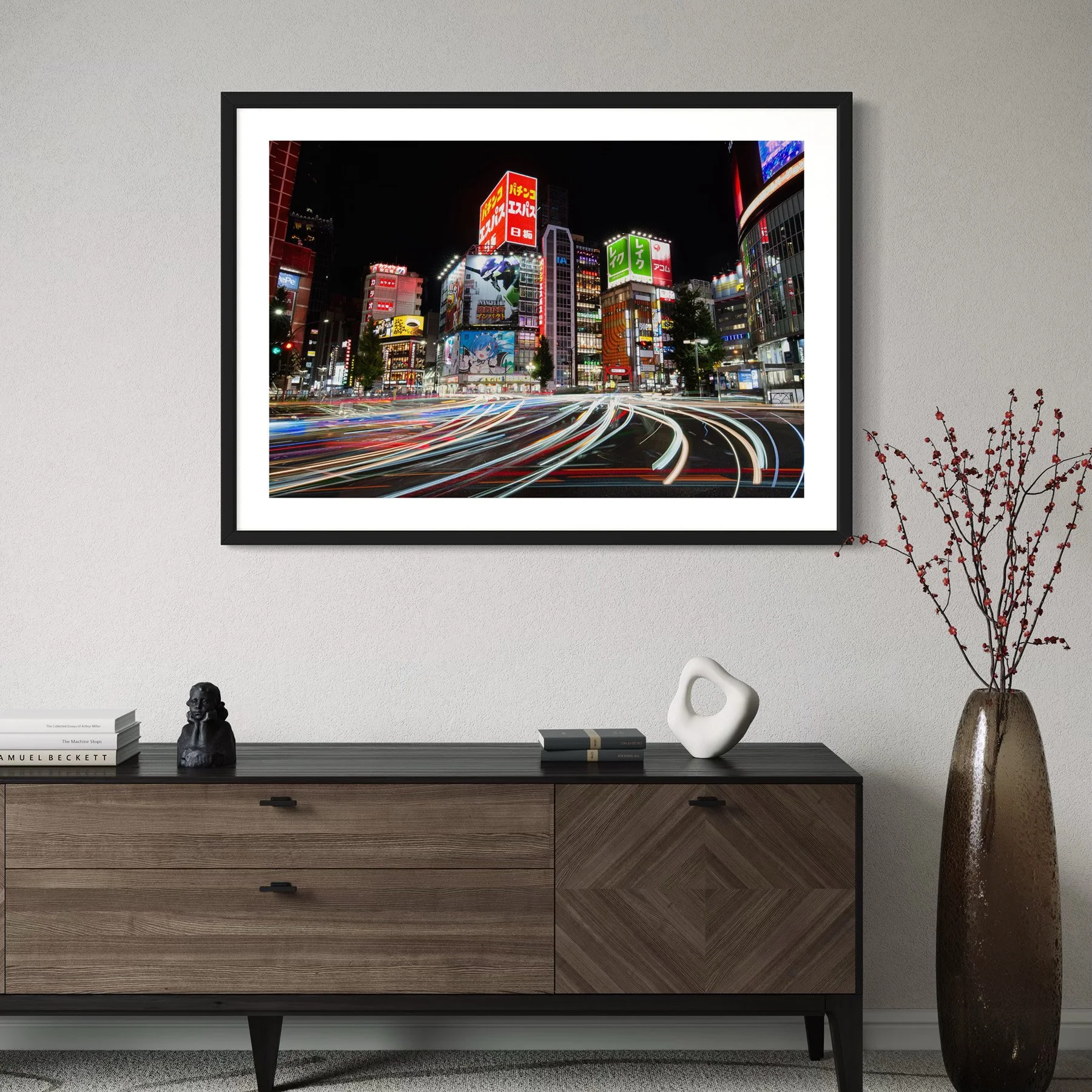 Tokyo Light Layers photography print displayed above a dark timber sideboard in a contemporary interior, showcasing colourful neon city lights and urban motion.