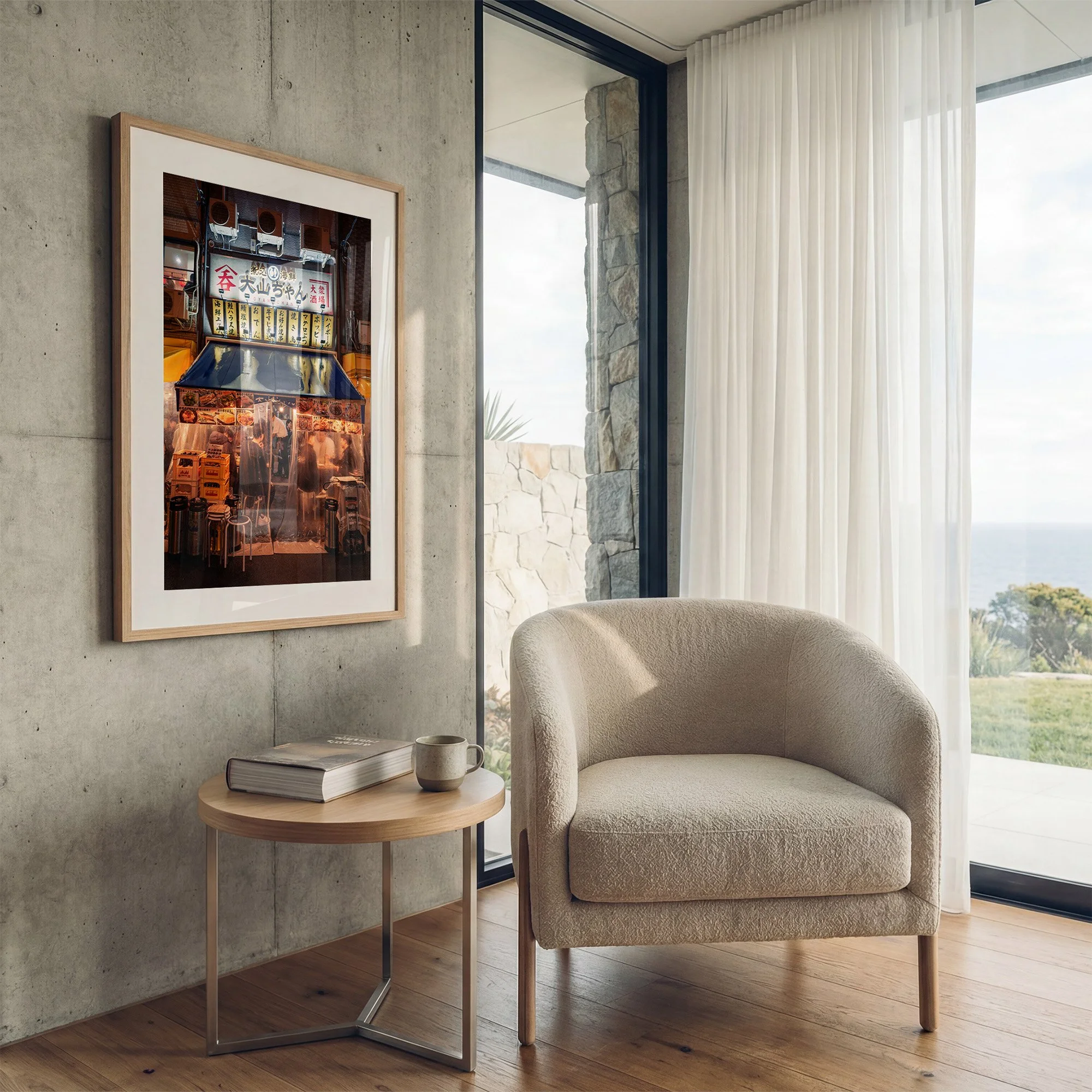 Tokyo izakaya photography print displayed in an oak frame on a concrete wall beside a contemporary armchair.