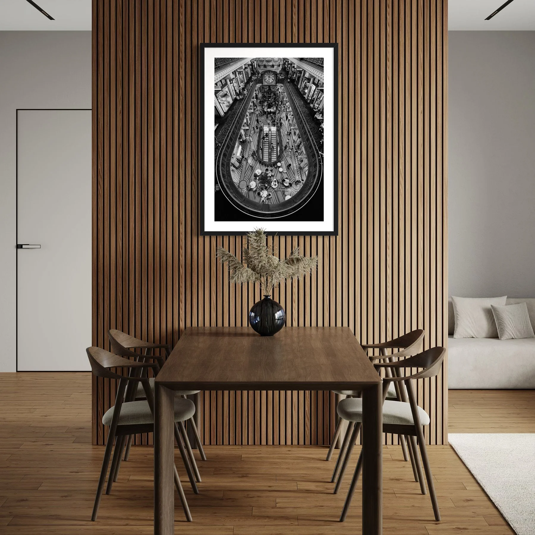 QVB Arcade Below black and white architectural print displayed above a dining table against a contemporary timber slat feature wall.