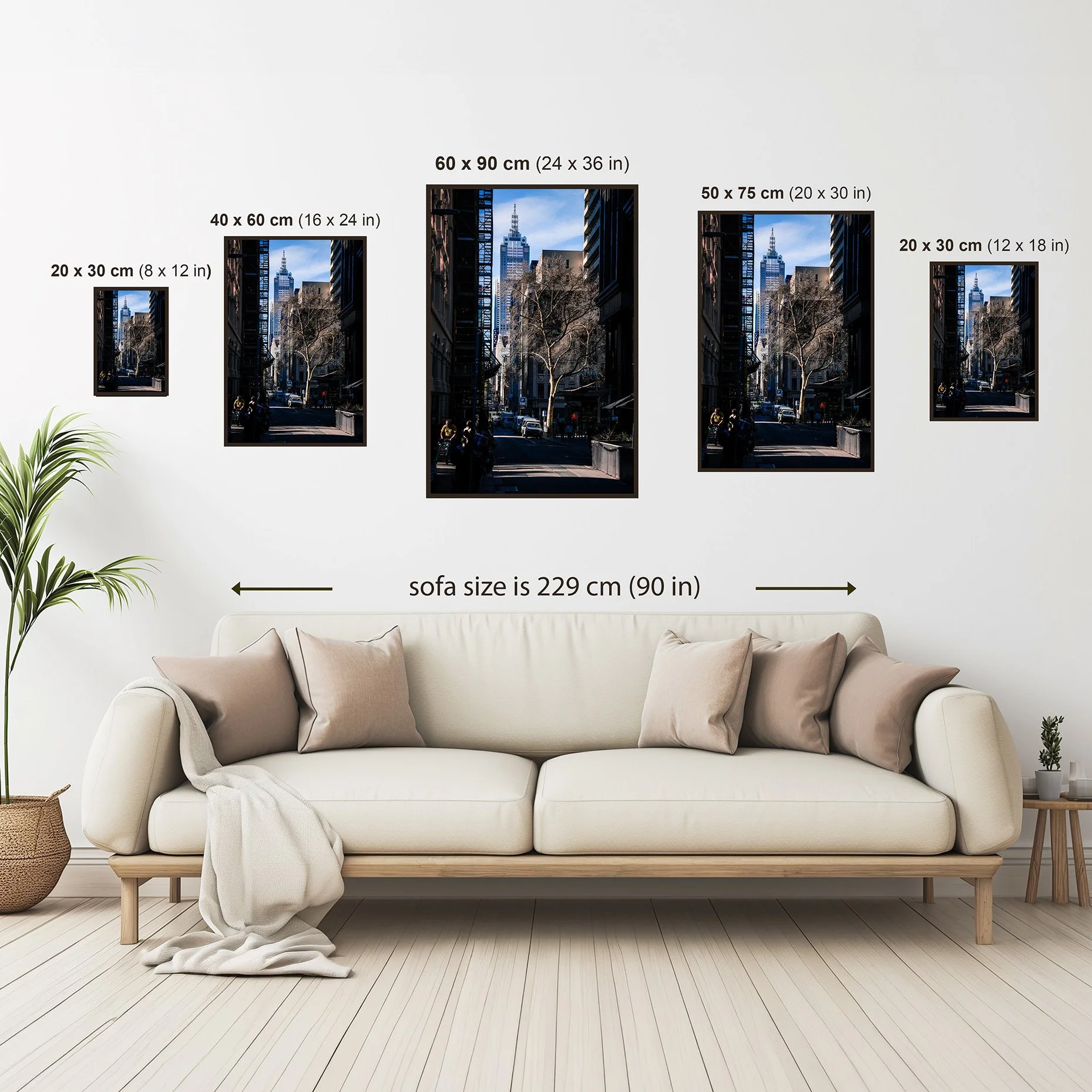 Size comparison showing the Melbourne fine art print available in multiple sizes displayed above a sofa.