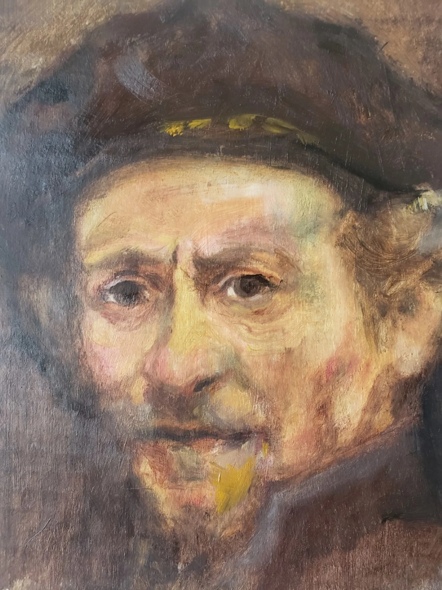 A study of Rembrandt's sel-portrait featuring detailed facial features and expressive brushstrokes.