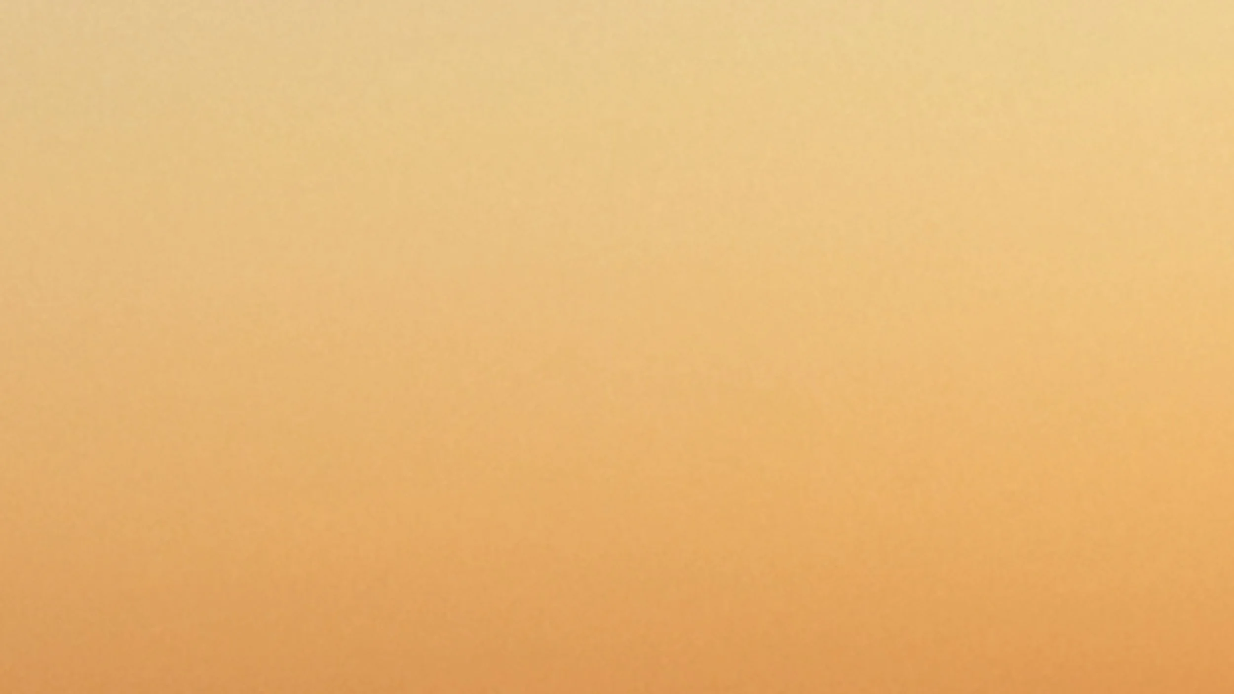 An opaque yellow-orange sunset photo, used as a background image with no distinguishable objects or features.