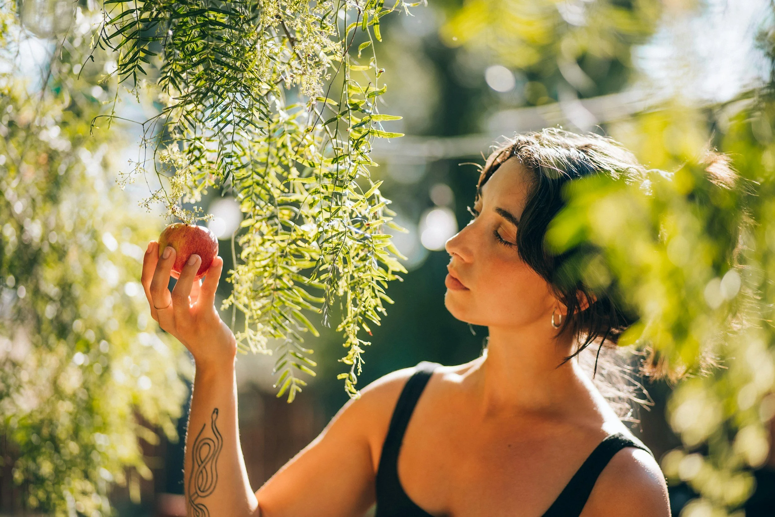 woman outdoors pondering if natural birth control will work for her.