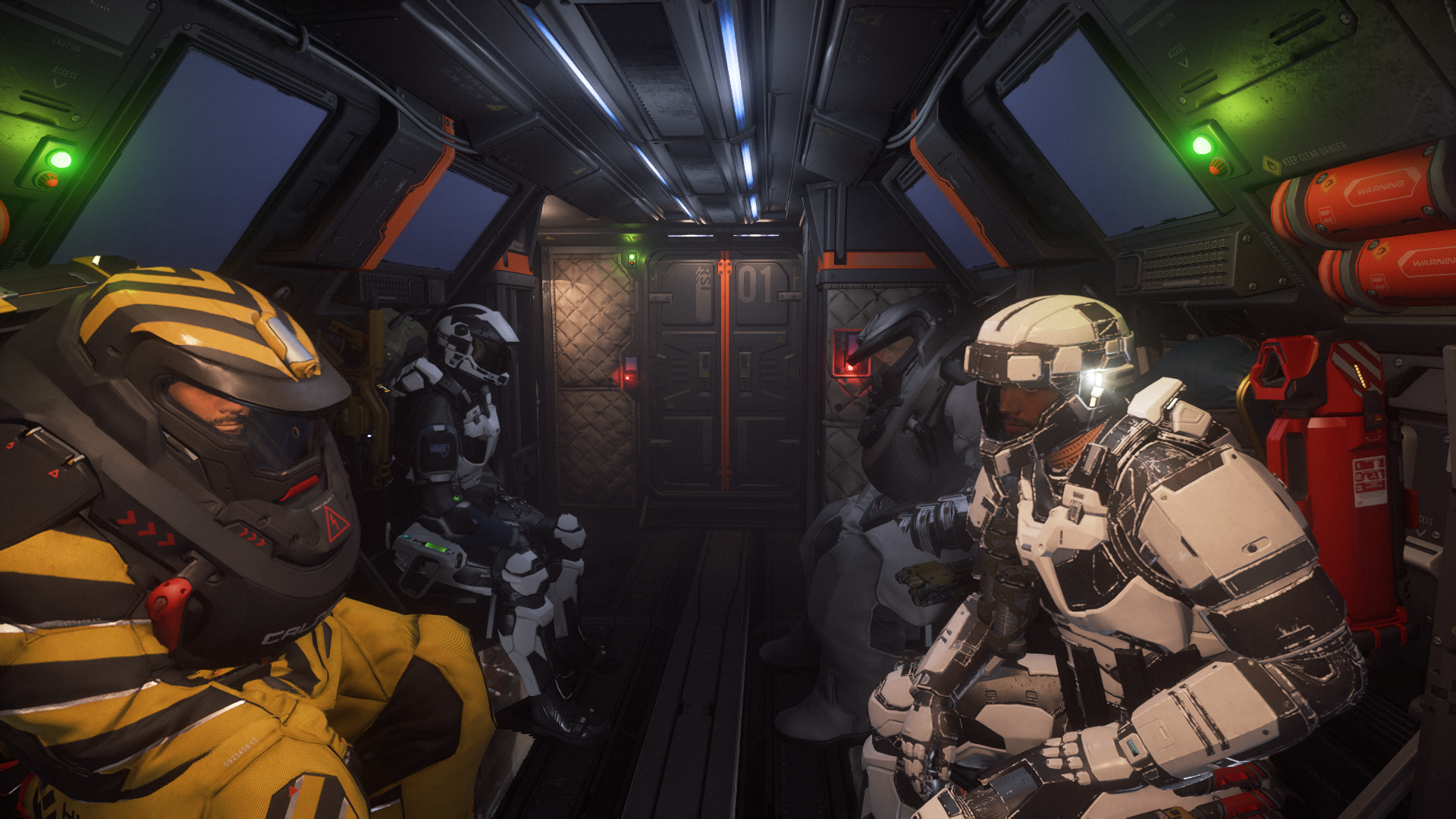 Four astronauts in space suits sitting inside a spaceship, with a dark operational environment filled with control panels, screens, and equipment.