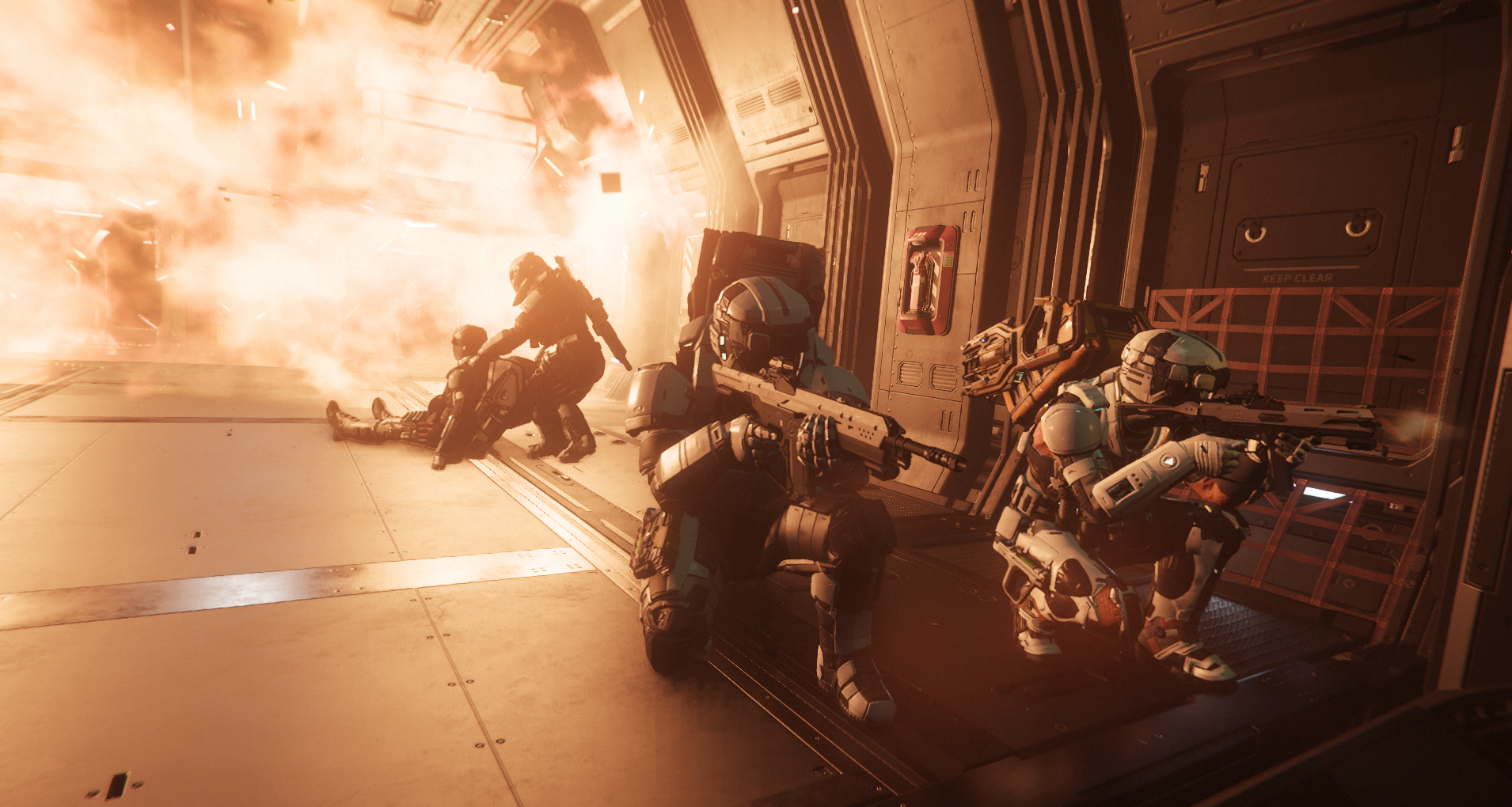 Scientists in futuristic armor take cover behind a wall on a spaceship, with an explosion and fire in the background.