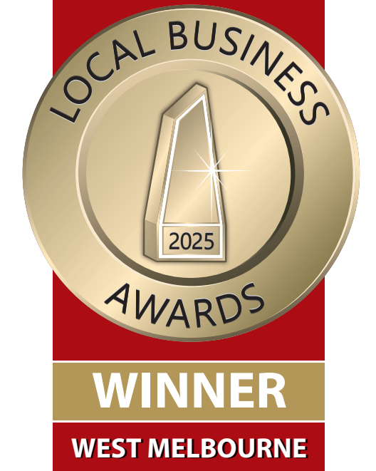 A gold medal with black text reading "Local Business Awards 2025" and a stylized award trophy in the center. Below the medal, a gold banner says "WINNER" in white and underneath, a red background with white text says "West Melbourne."