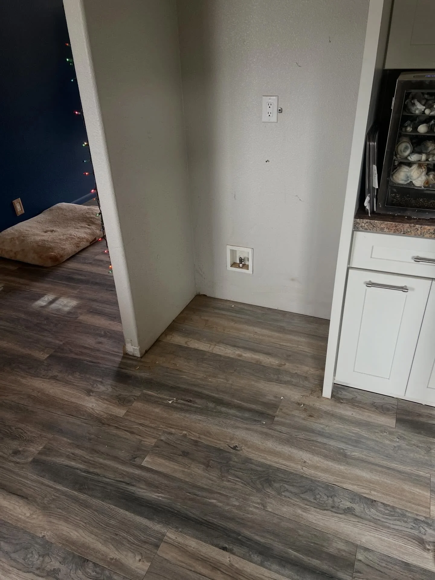 This job started with a burst water line that flooded the crawlspace and soaked up into the subfloor. The moisture caused the laminate flooring and subfloor to swell and fail.

We removed all wet materials and insulation, cut out and replaced damaged