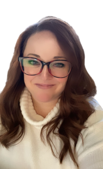 A woman with long brown hair, wearing glasses with black and red frames, and a white turtleneck sweater, smiling at the camera.