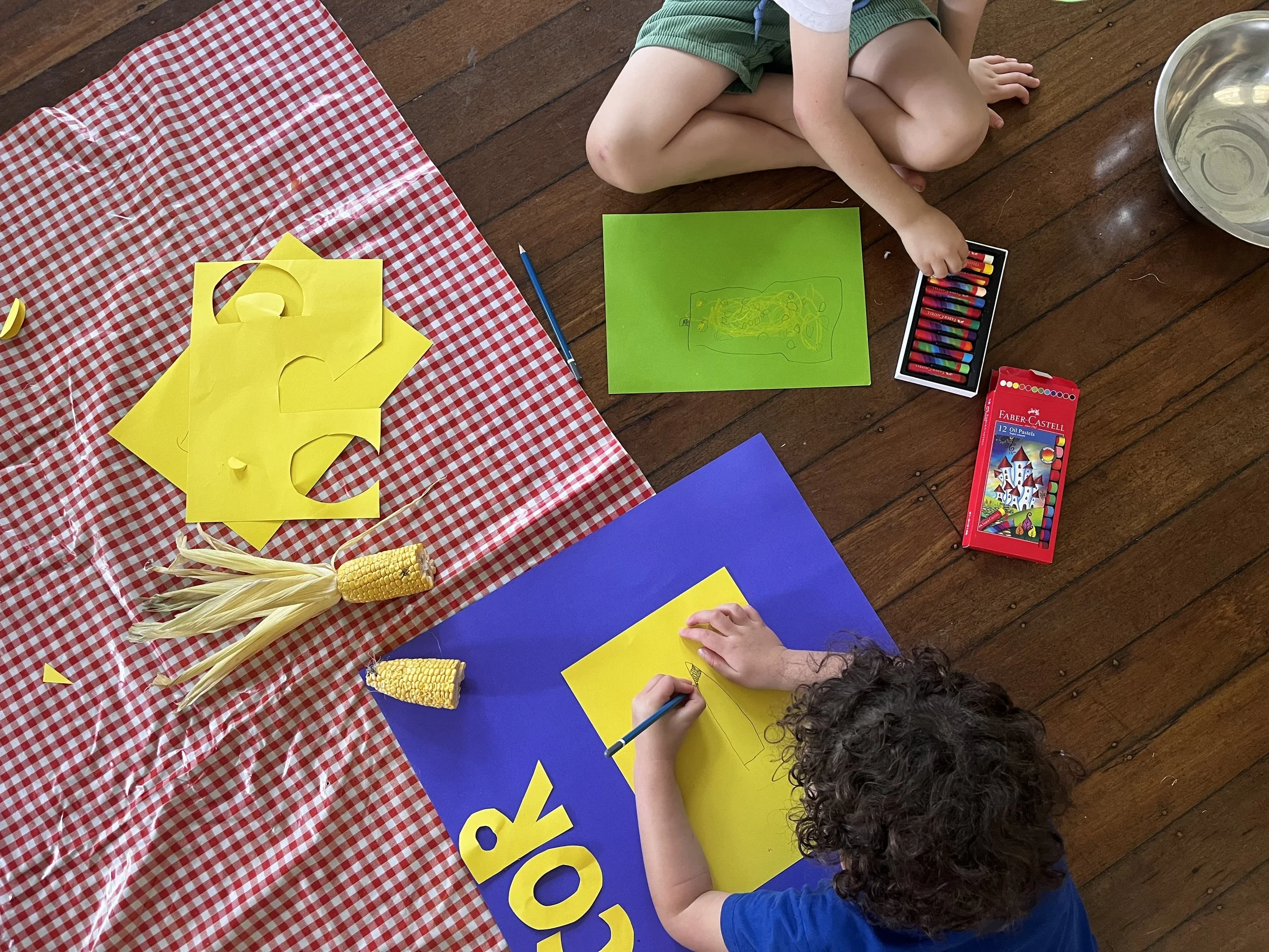 ...and the boys created a poster about corn. Children will always be met where they are in terms of their skills, interests and arc of development.