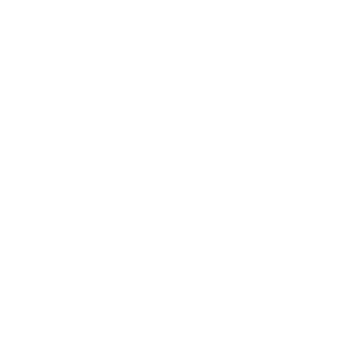 Silhouette of a person with a welding helmet using a welding torch to join metal pieces, sparks flying.