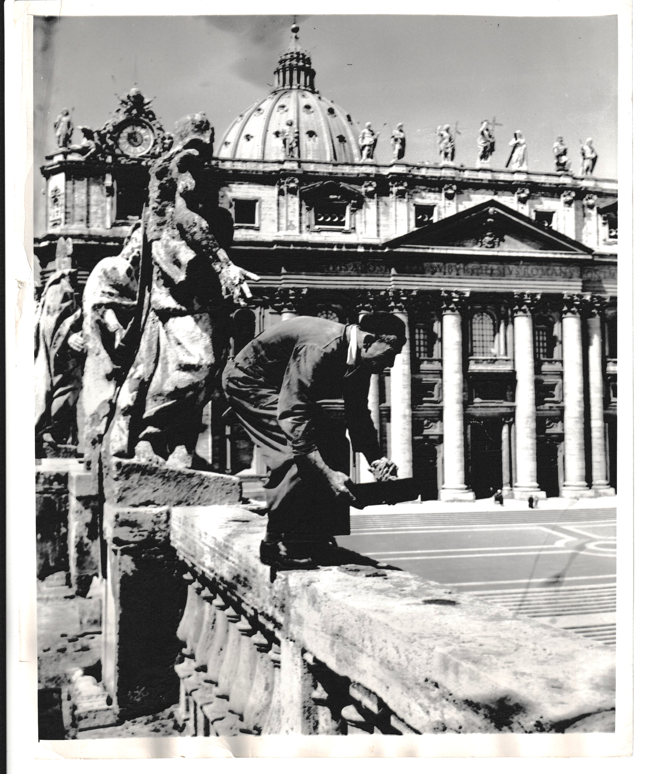 Giovanni Segoni (57) in 1948, making repairs 180 feet above St. Peter's Square. Photo owned by author