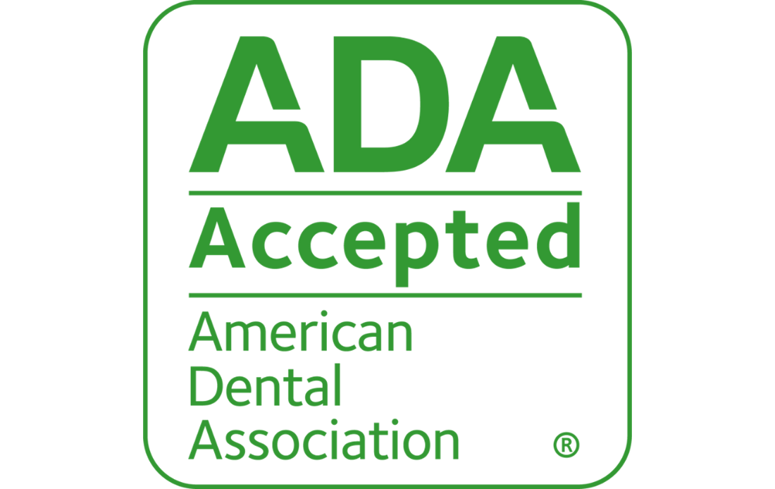 Green and black ADA Accepted logo with text indicating approval from the American Dental Association.