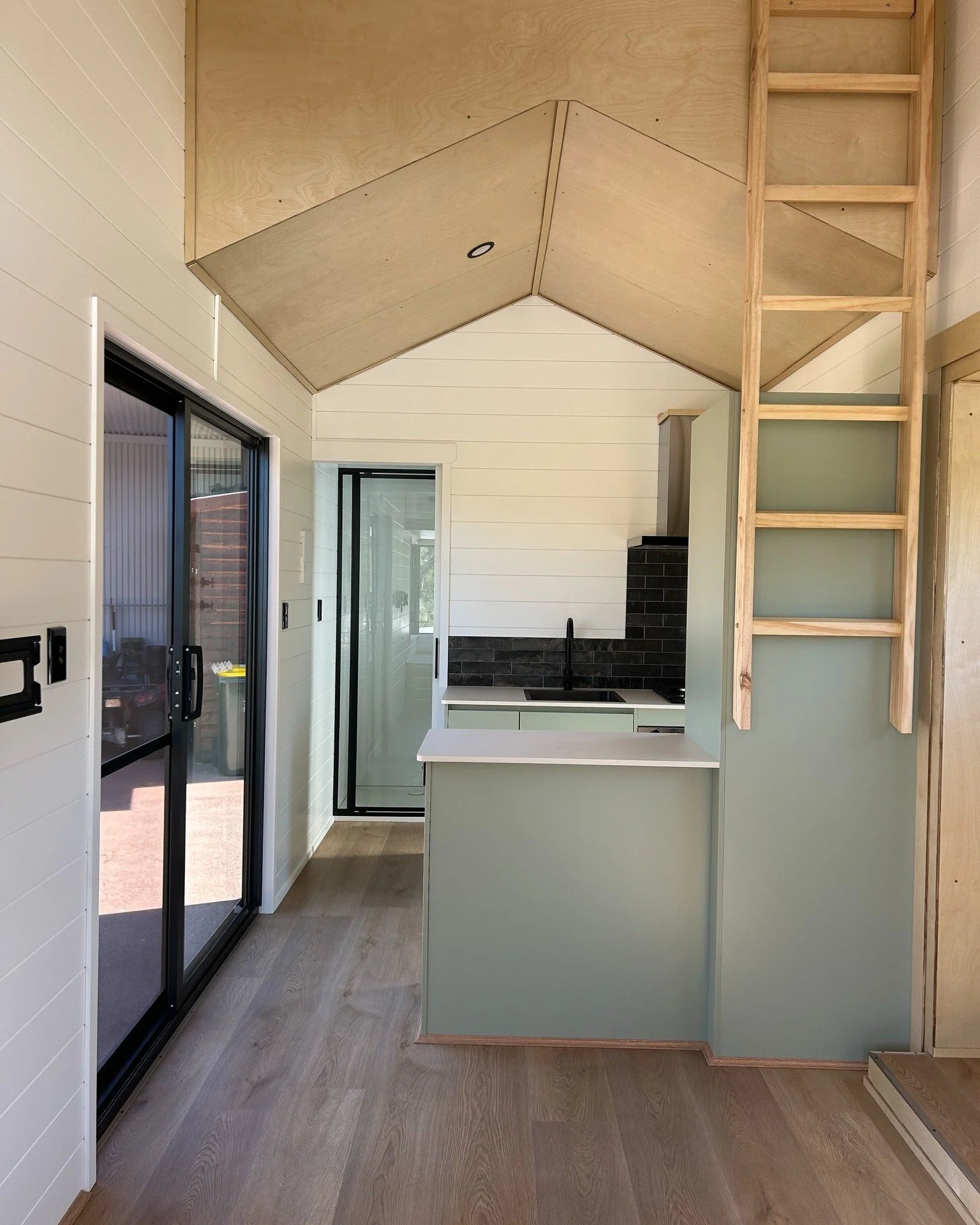 It&rsquo;s the little details that make a big difference. At Tiny Homes Perth, we create custom pieces to complete each space, like this handcrafted barn door to the bathroom 🤍