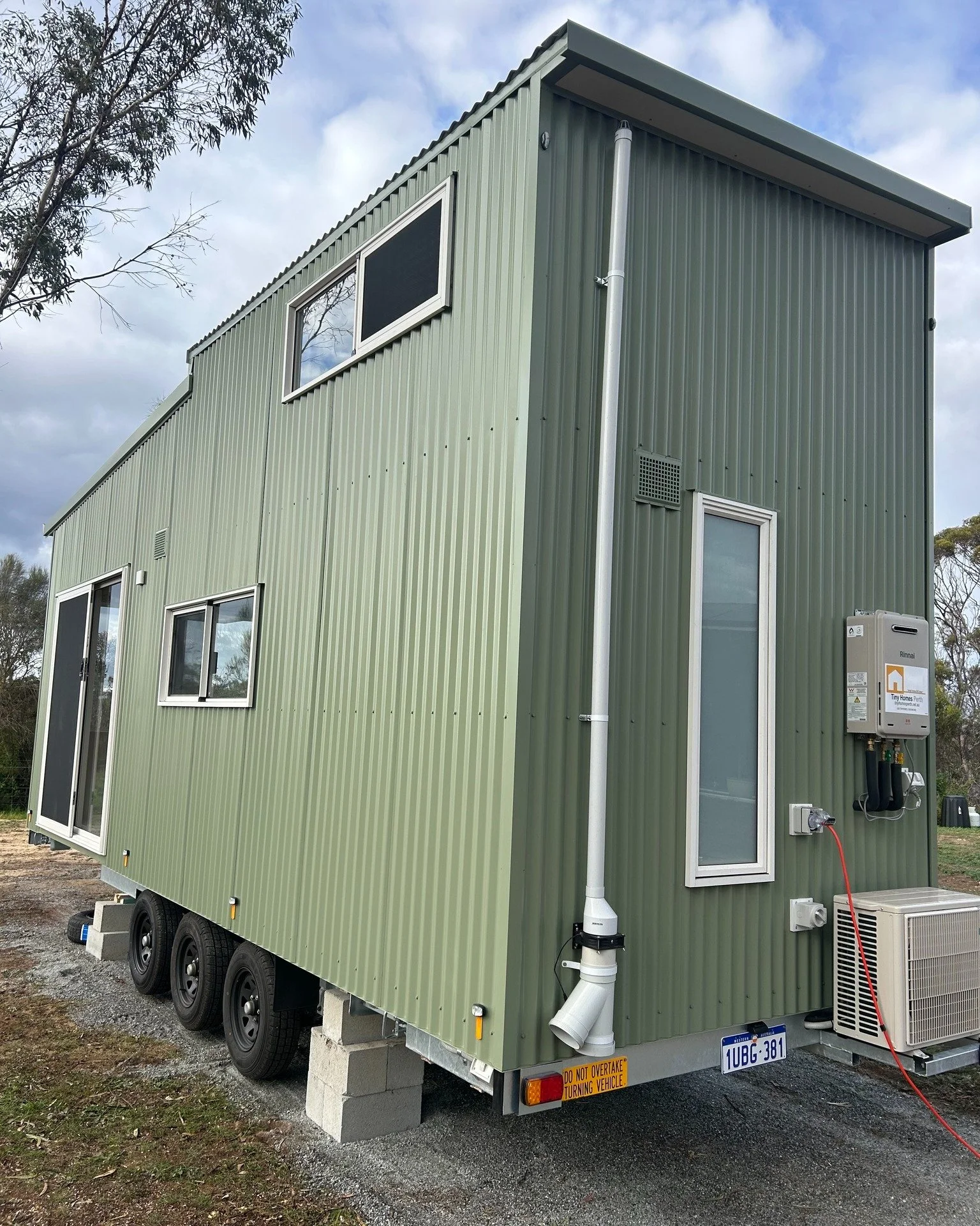 Our loft designs create a natural divide between your bedroom and living space, giving you privacy, flow, and room to unwind in your tiny home!