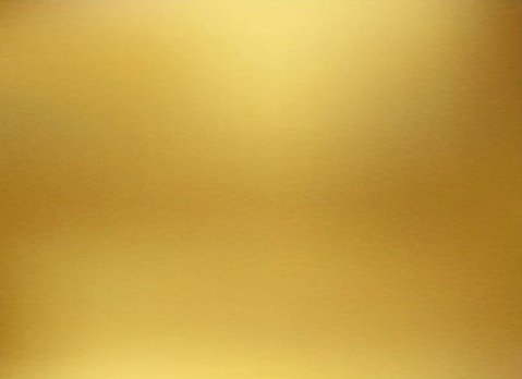 A gold-colored surface with a smooth, reflective finish.