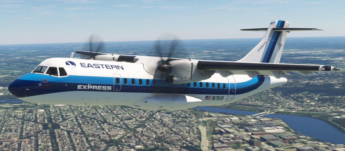 A twin-turboprop airplane flying over a city with a river, with blue and white livery and the words 'Eastern Express' on the side.
