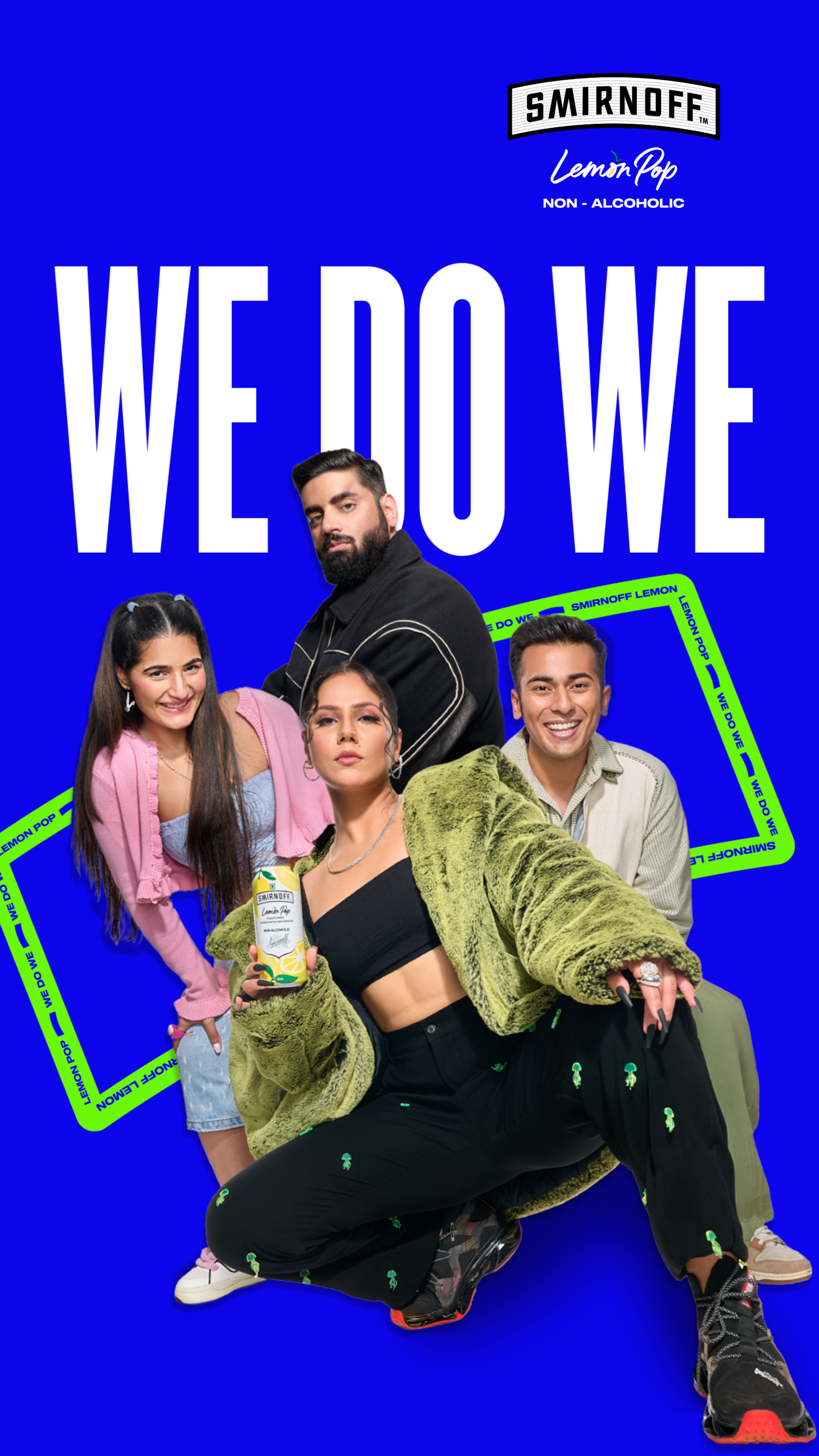 A promotional poster for Smirnoff Lemon Pop non-alcoholic beverage featuring four young adults posing for the camera against a bright blue background. The group includes a woman with long dark hair wearing a pink jacket, a woman with short hair in a green fuzzy jacket holding a can of Lemon Pop, a man with short hair in a beige shirt, and a man with a beard in a black jacket. The words "WE DO WE" are written in large white text, with Smirnoff branding and Lemon Pop in smaller text.